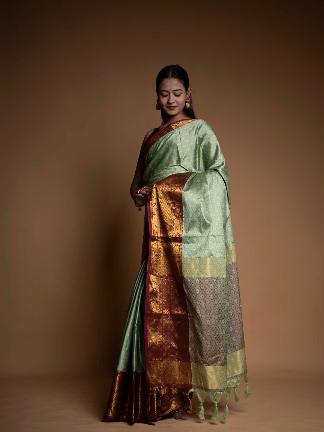 Graceful Mint Green Silk  with Rich Zari Border Ready To Wear Saree
