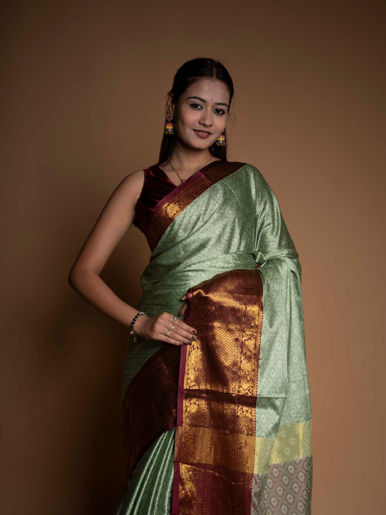 Graceful Mint Green Silk  with Rich Zari Border Ready To Wear Saree