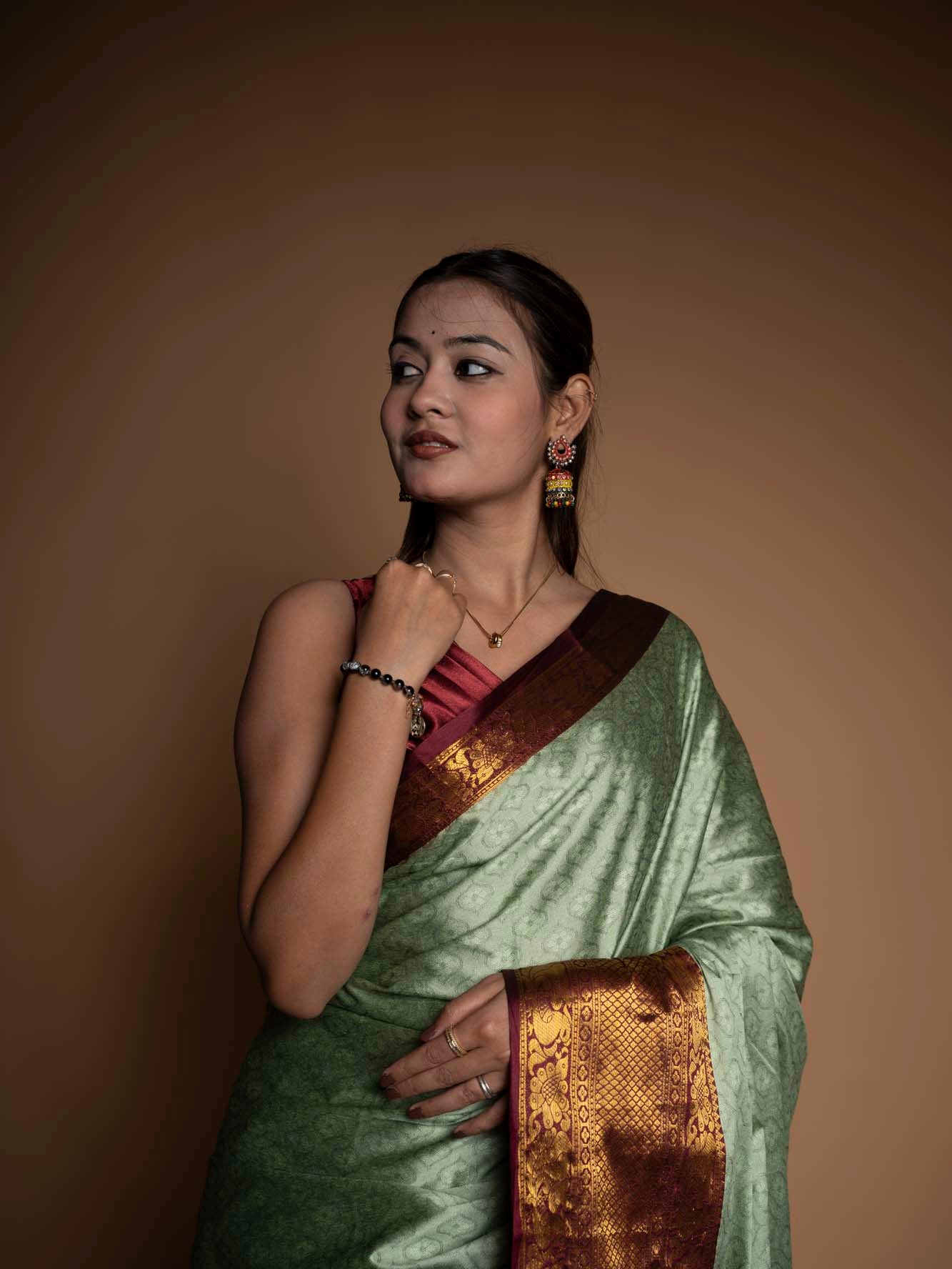 Graceful Mint Green Silk  with Rich Zari Border Ready To Wear Saree