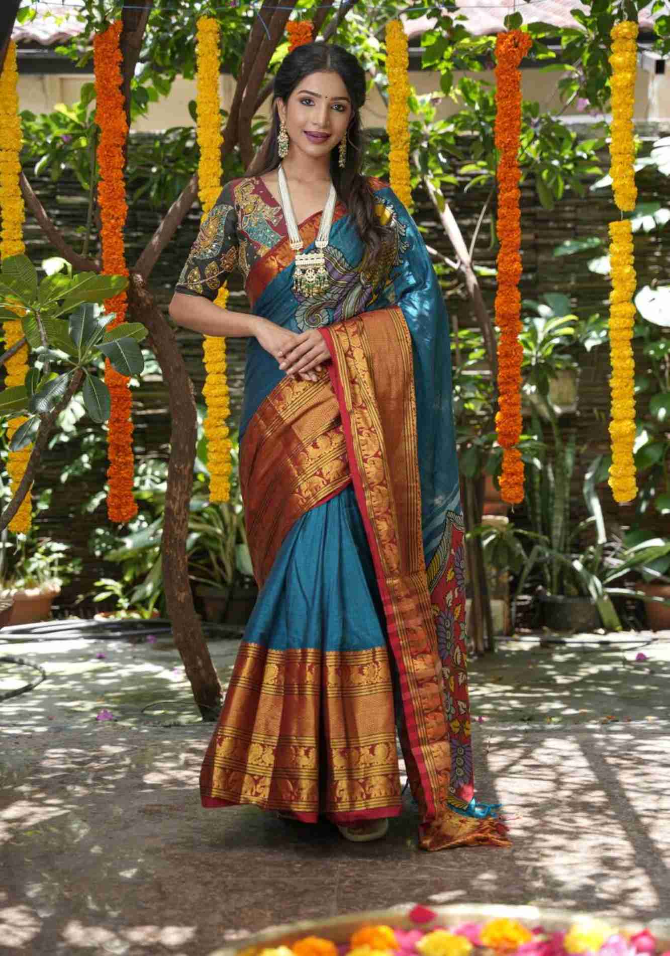 Peacock blue Narayanpet saree with pen kalamkari appliqué and wide zari borders Pre Drape Saree