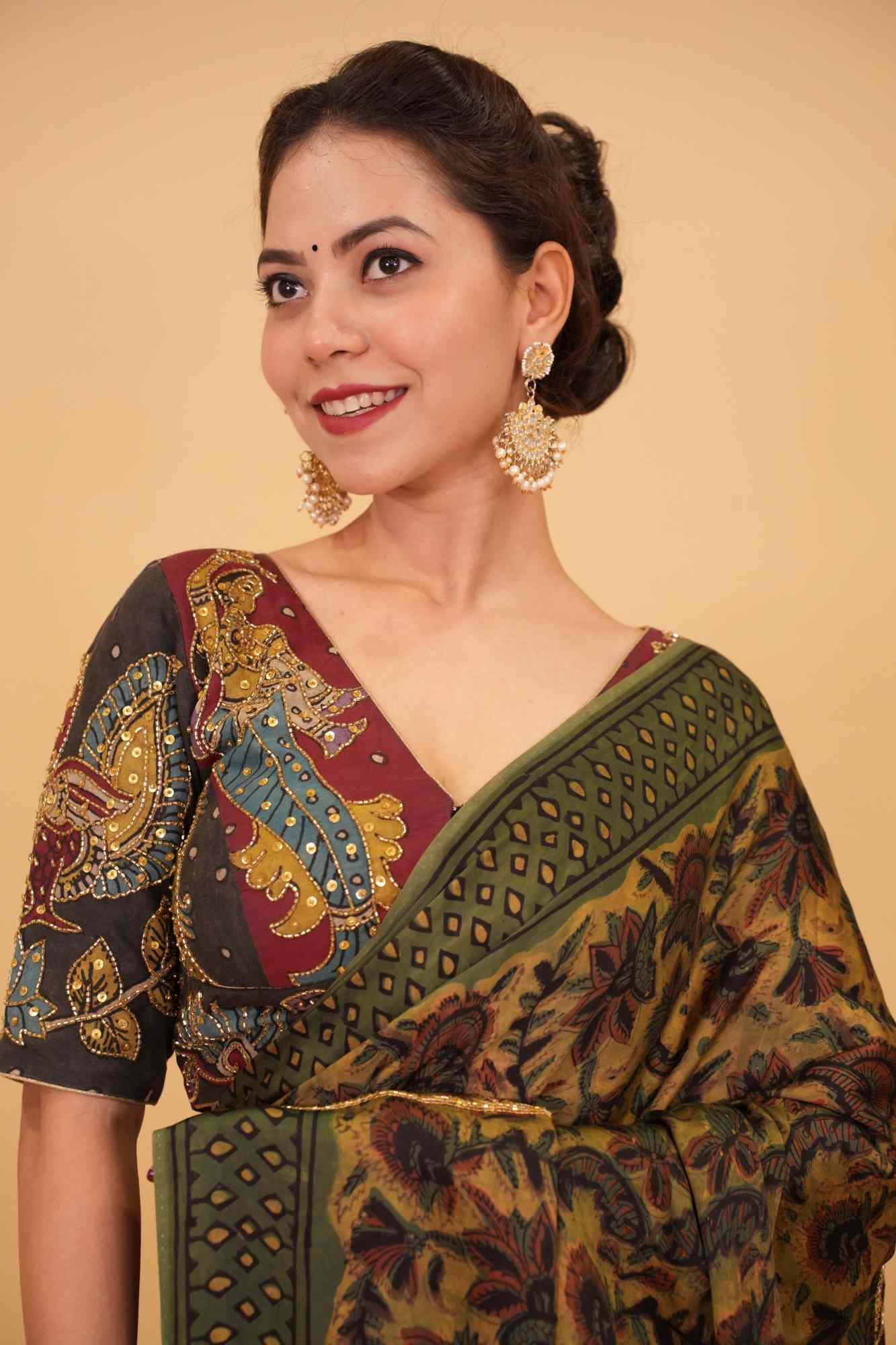 Maroon and Black Handcrafted Kalamkari Embroidery Blouse with Cutdana Work Detailings