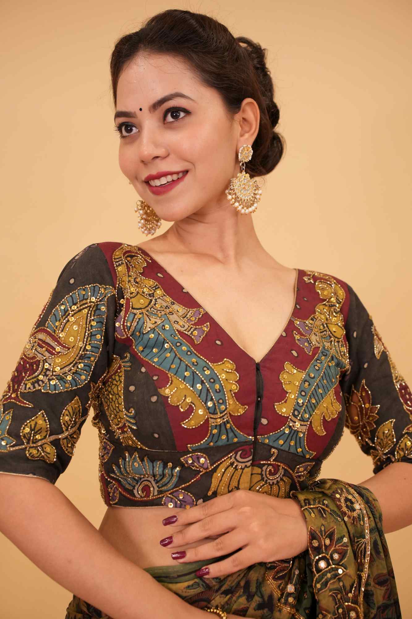 Maroon and Black Handcrafted Kalamkari Embroidery Blouse with Cutdana Work Detailings