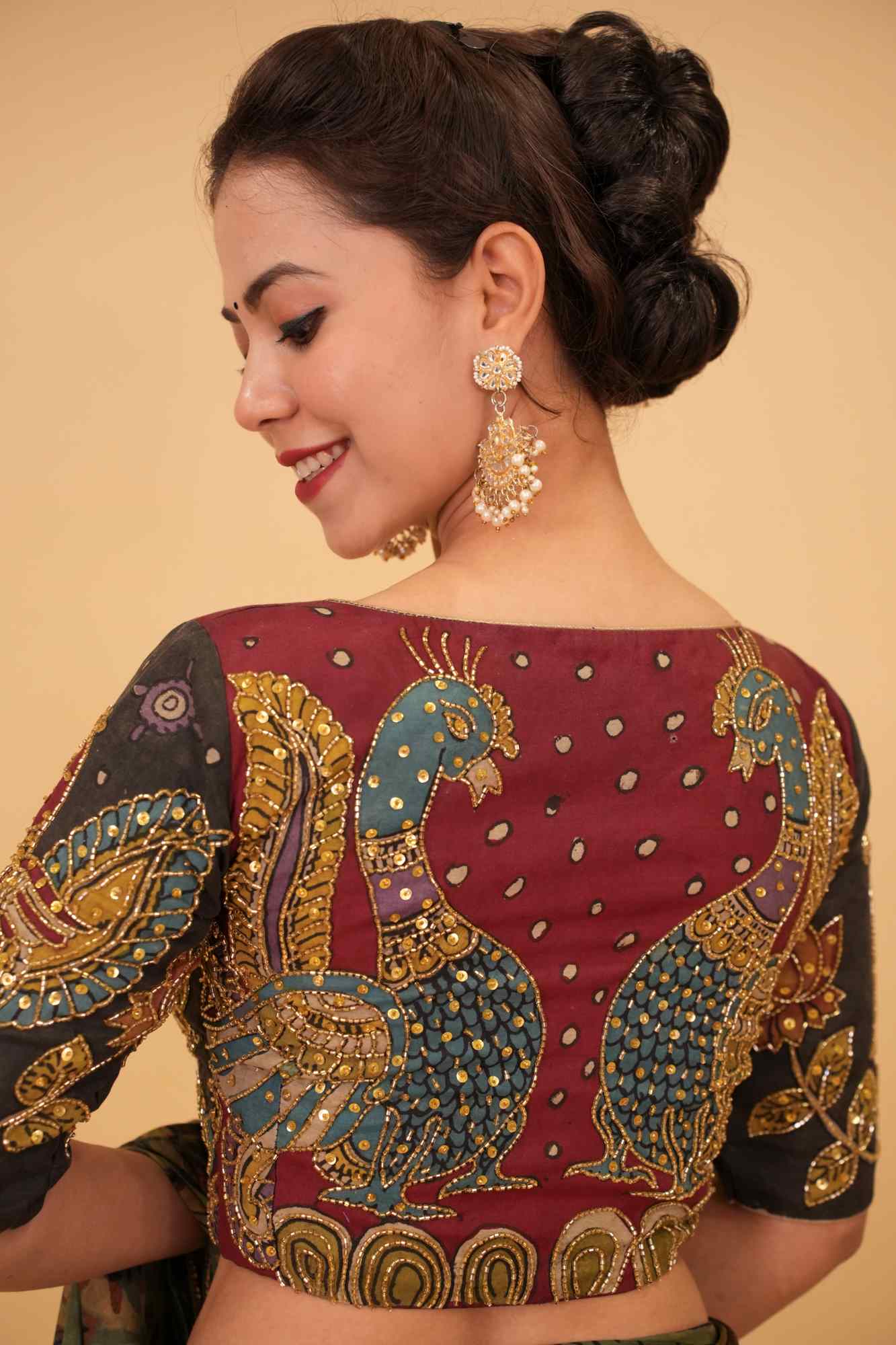 Maroon and Black Handcrafted Kalamkari Embroidery Blouse with Cutdana Work Detailings