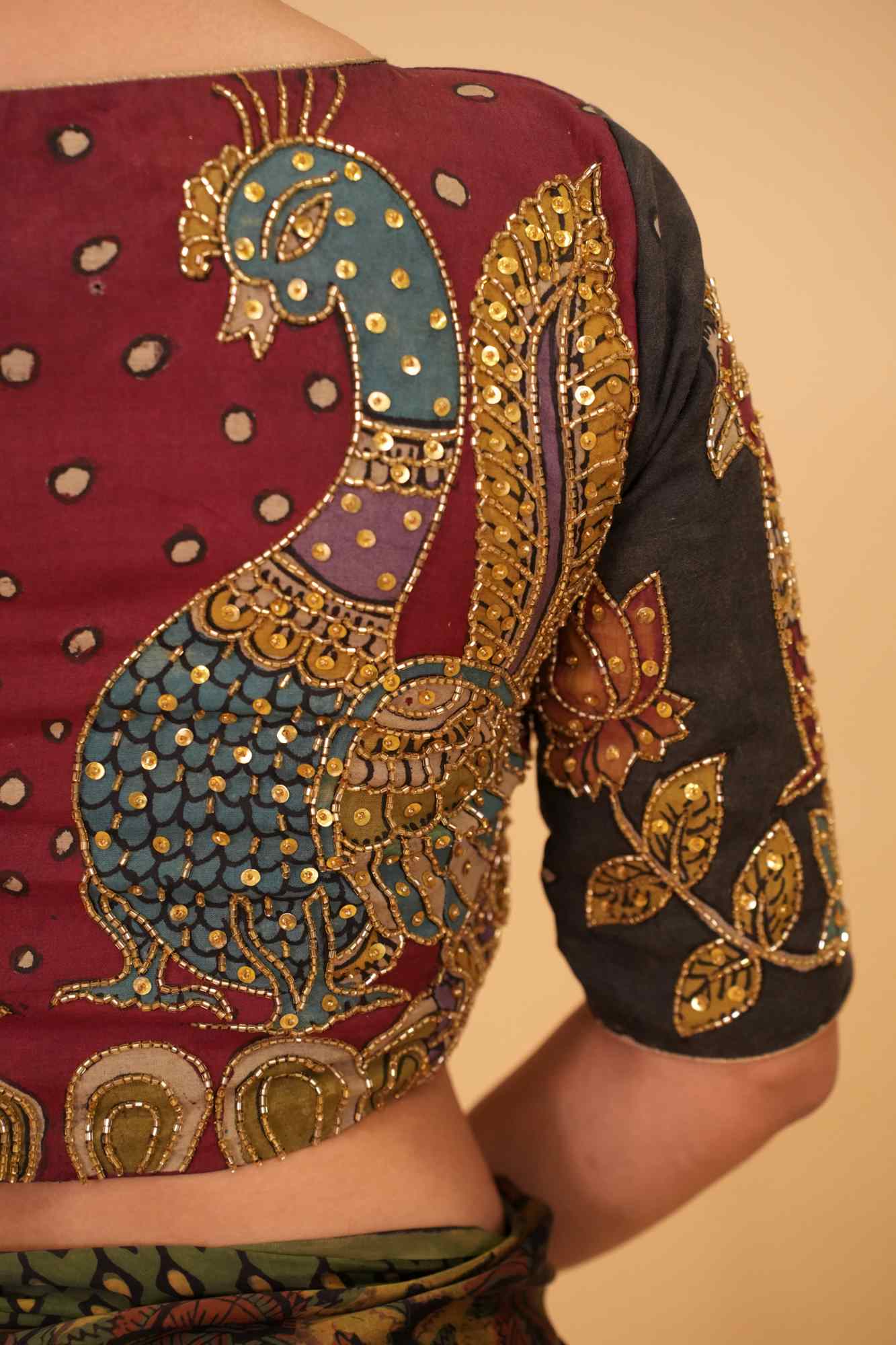 Maroon and Black Handcrafted Kalamkari Embroidery Blouse with Cutdana Work Detailings