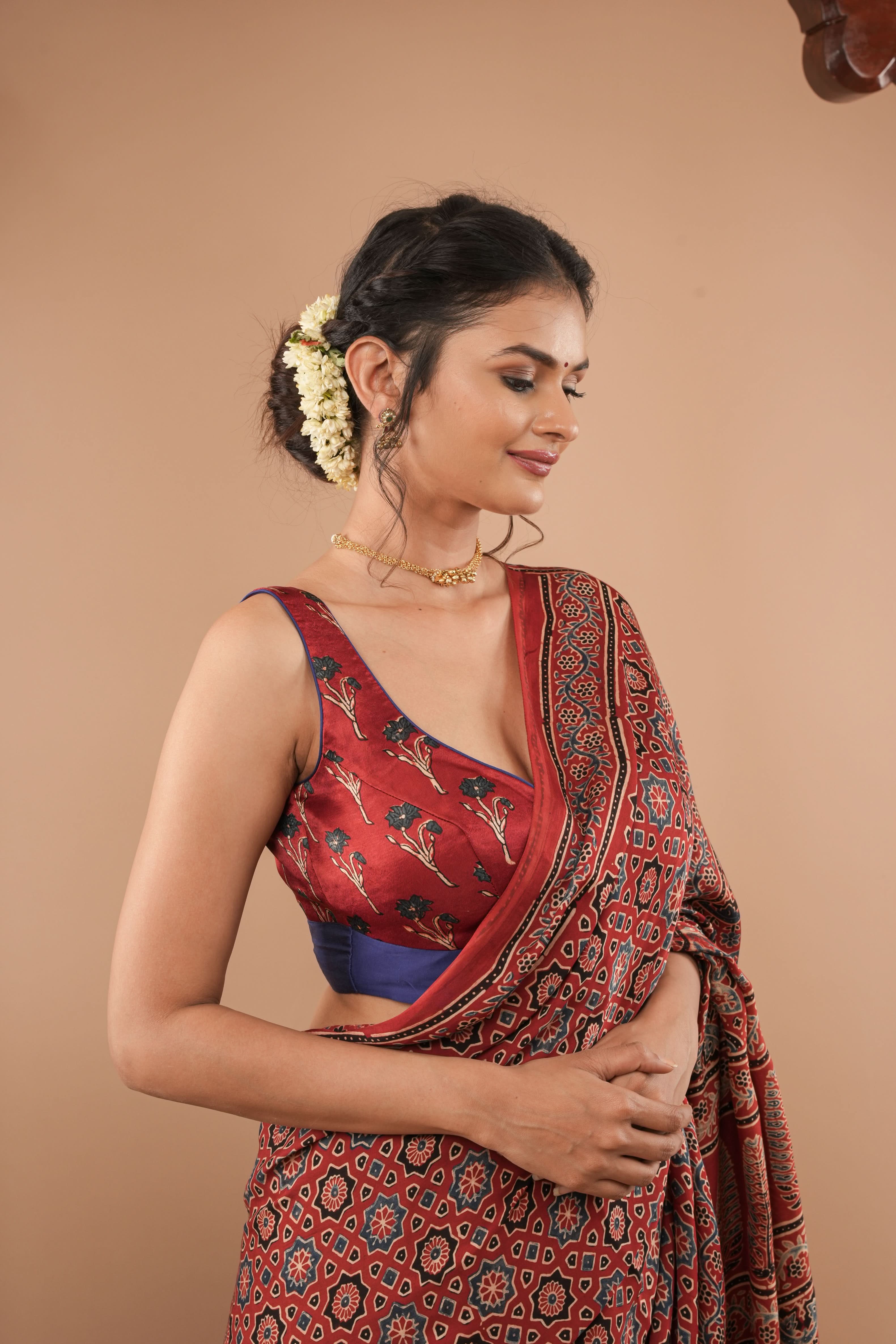 Red Ajrakh modal silk plunge neck and sleeveless blouse | Made to Order | Shobitam