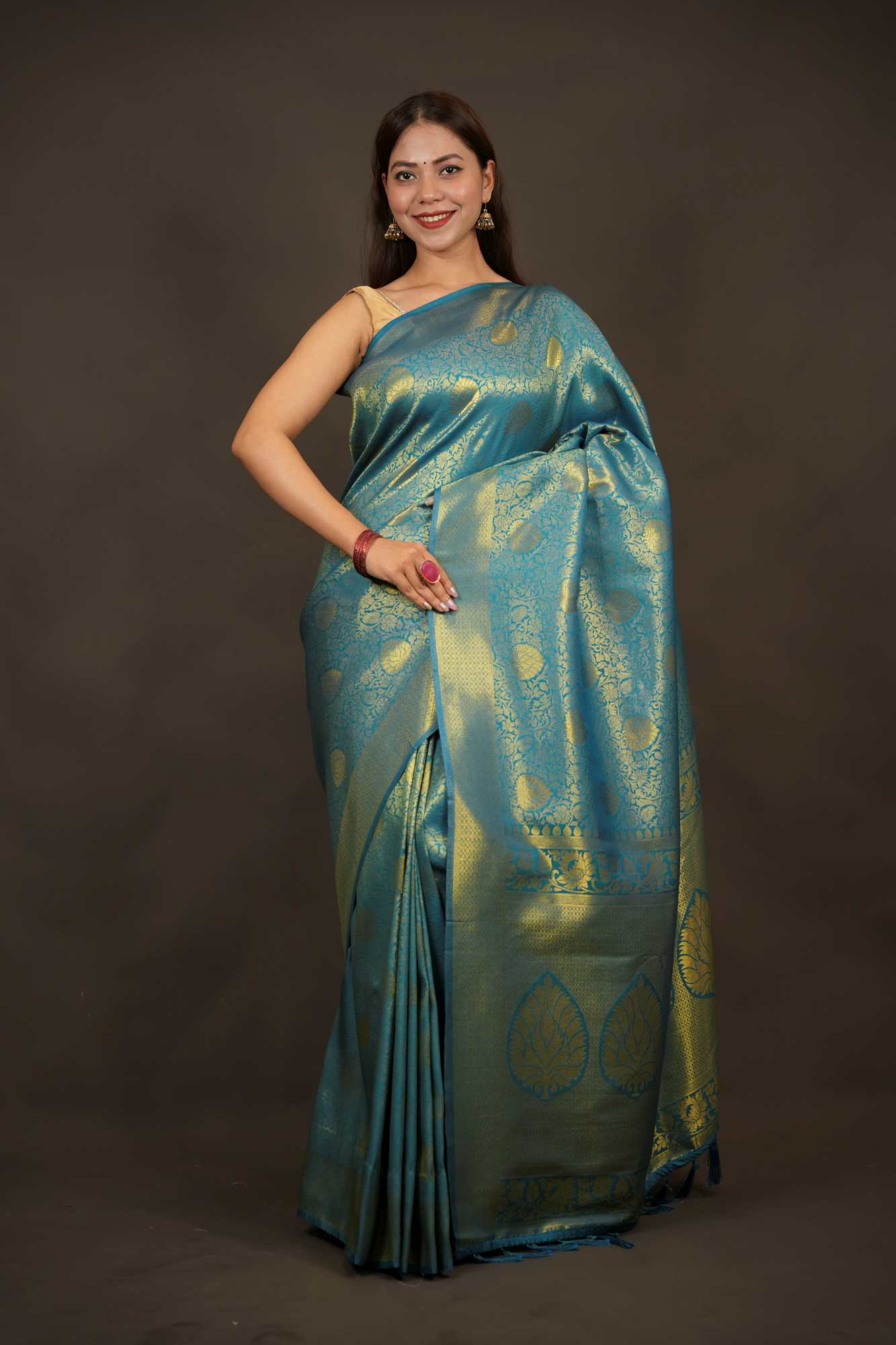 Traditional Kanjivaram with grand pallu and self weaving dhoop chaanv zari work prestitched saree