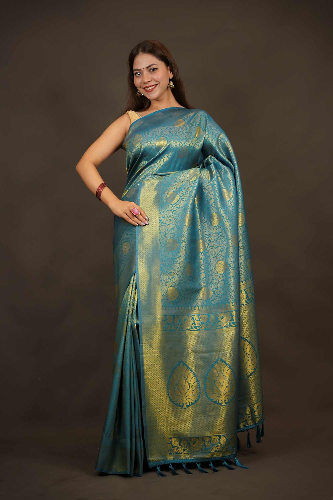 Traditional Kanjivaram with grand pallu and self weaving dhoop chaanv zari work prestitched saree