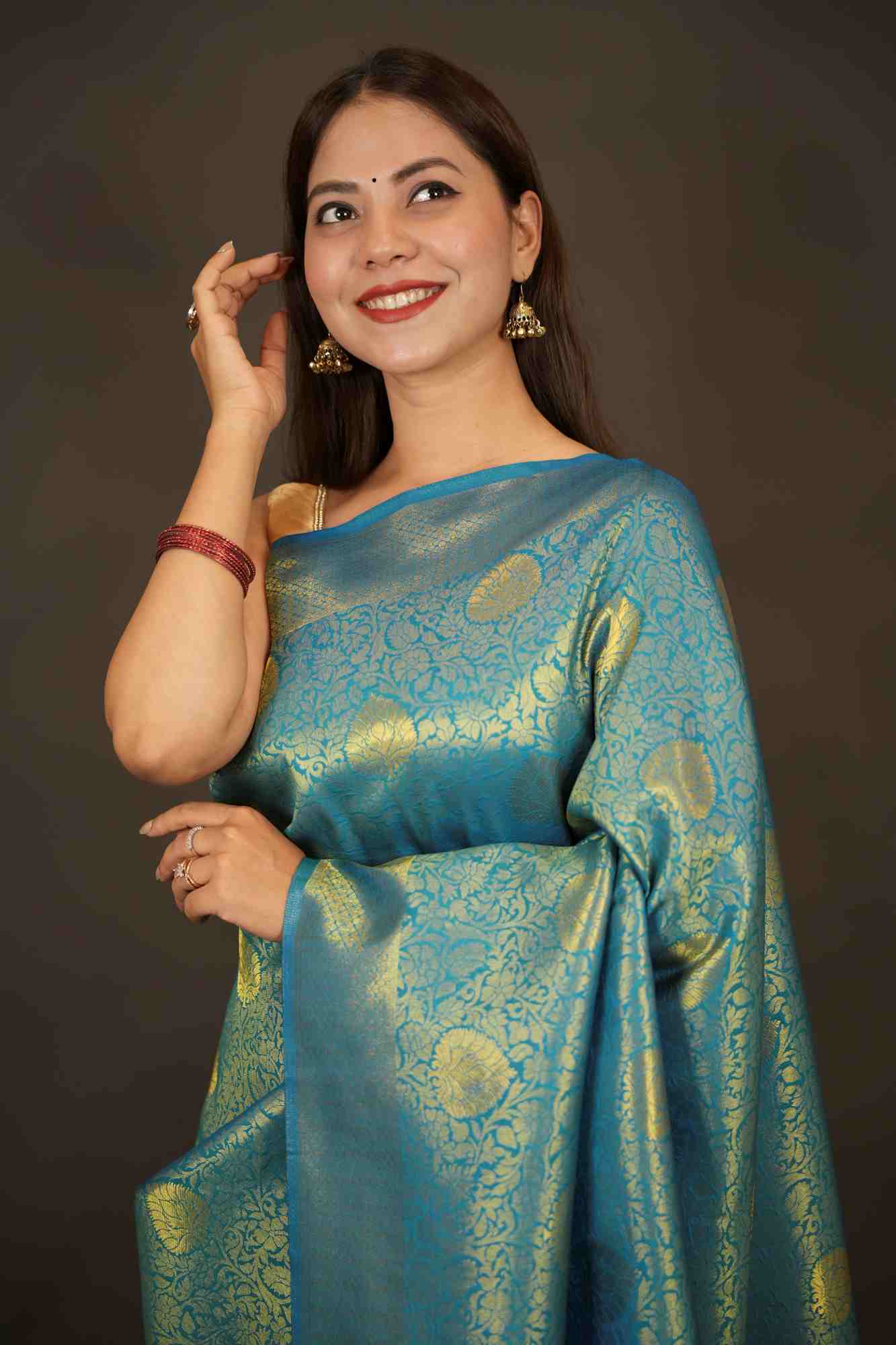 Traditional Kanjivaram with grand pallu and self weaving dhoop chaanv zari work prestitched saree