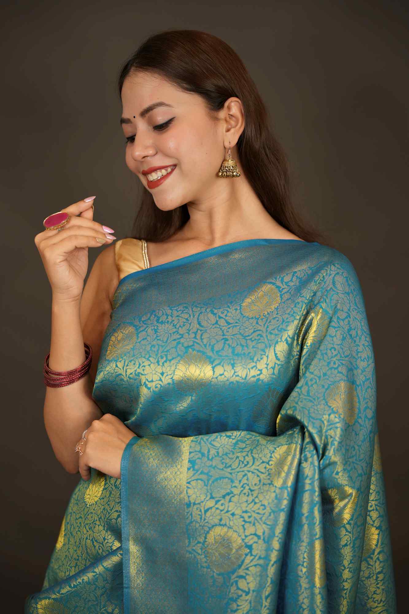 Traditional Kanjivaram with grand pallu and self weaving dhoop chaanv zari work prestitched saree