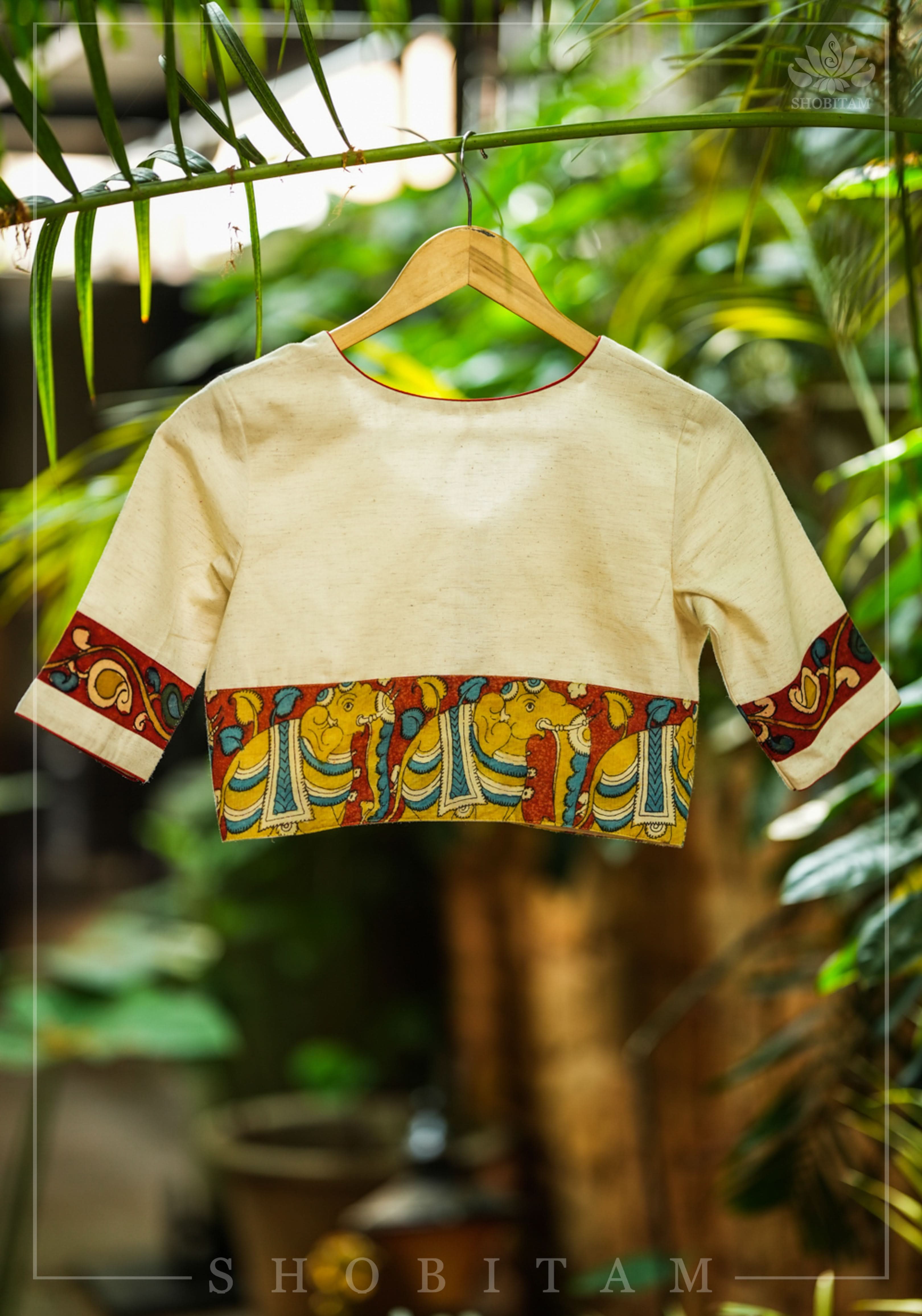 Daisy white V neck blouse with handpainted kalamkari border | Shobitam