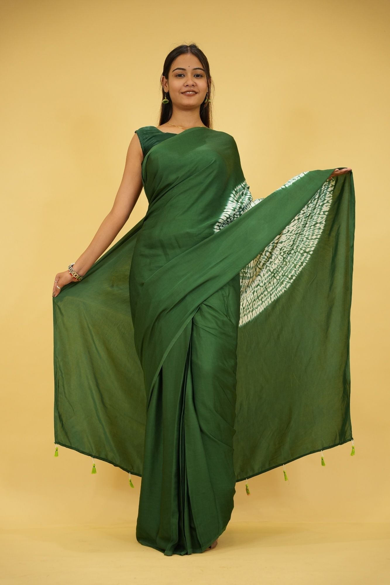 Pre drape Hand Shibori mandala Dye on Green Modal Silk And Tassel On Pallu saree