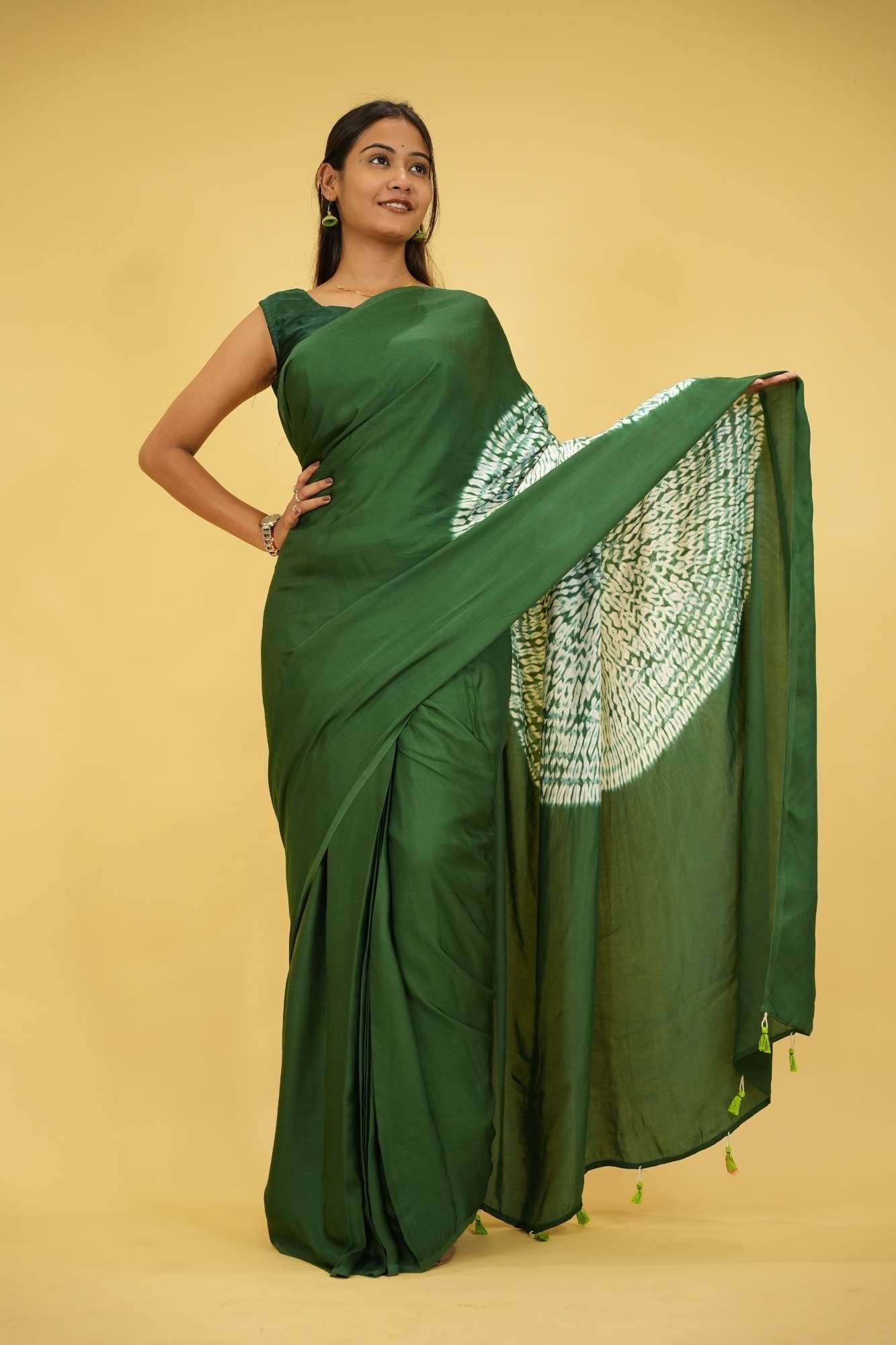 Pre drape Hand Shibori mandala Dye on Green Modal Silk And Tassel On Pallu saree