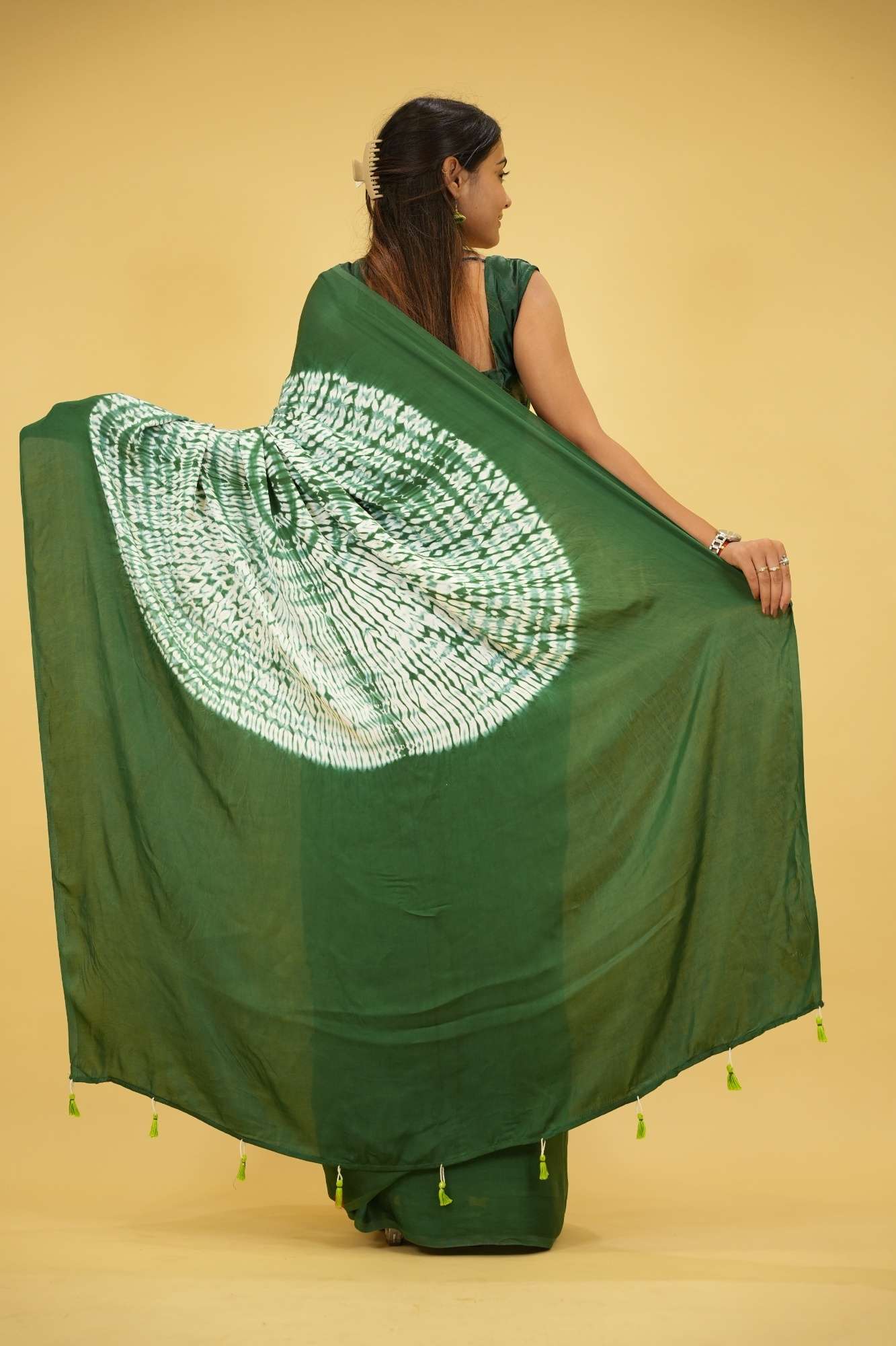 Pre drape Hand Shibori mandala Dye on Green Modal Silk And Tassel On Pallu saree