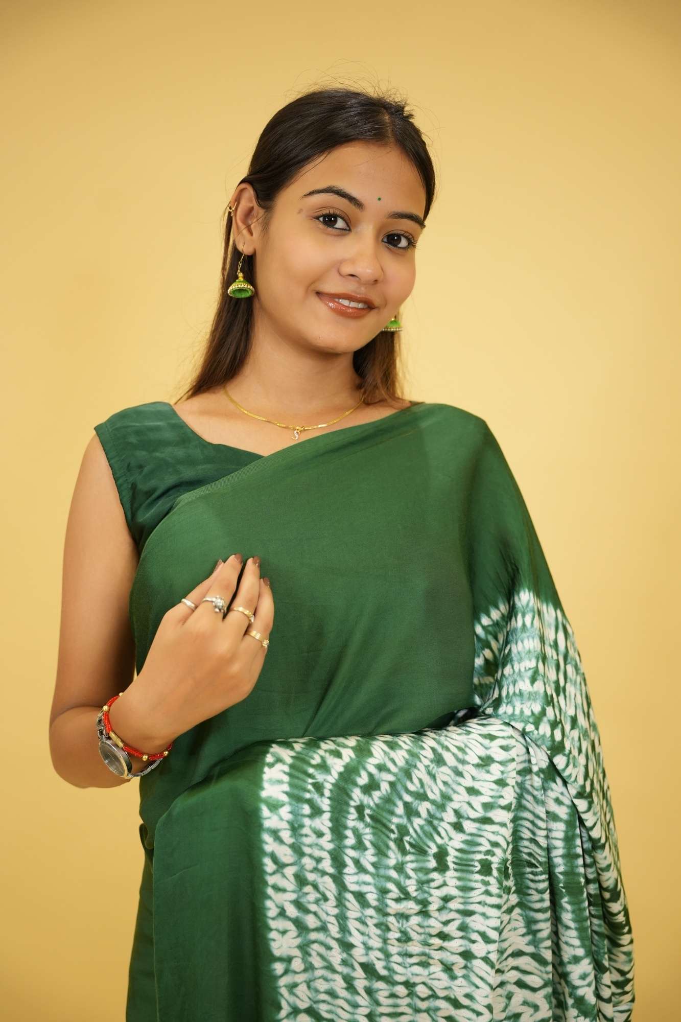 Pre drape Hand Shibori mandala Dye on Green Modal Silk And Tassel On Pallu saree