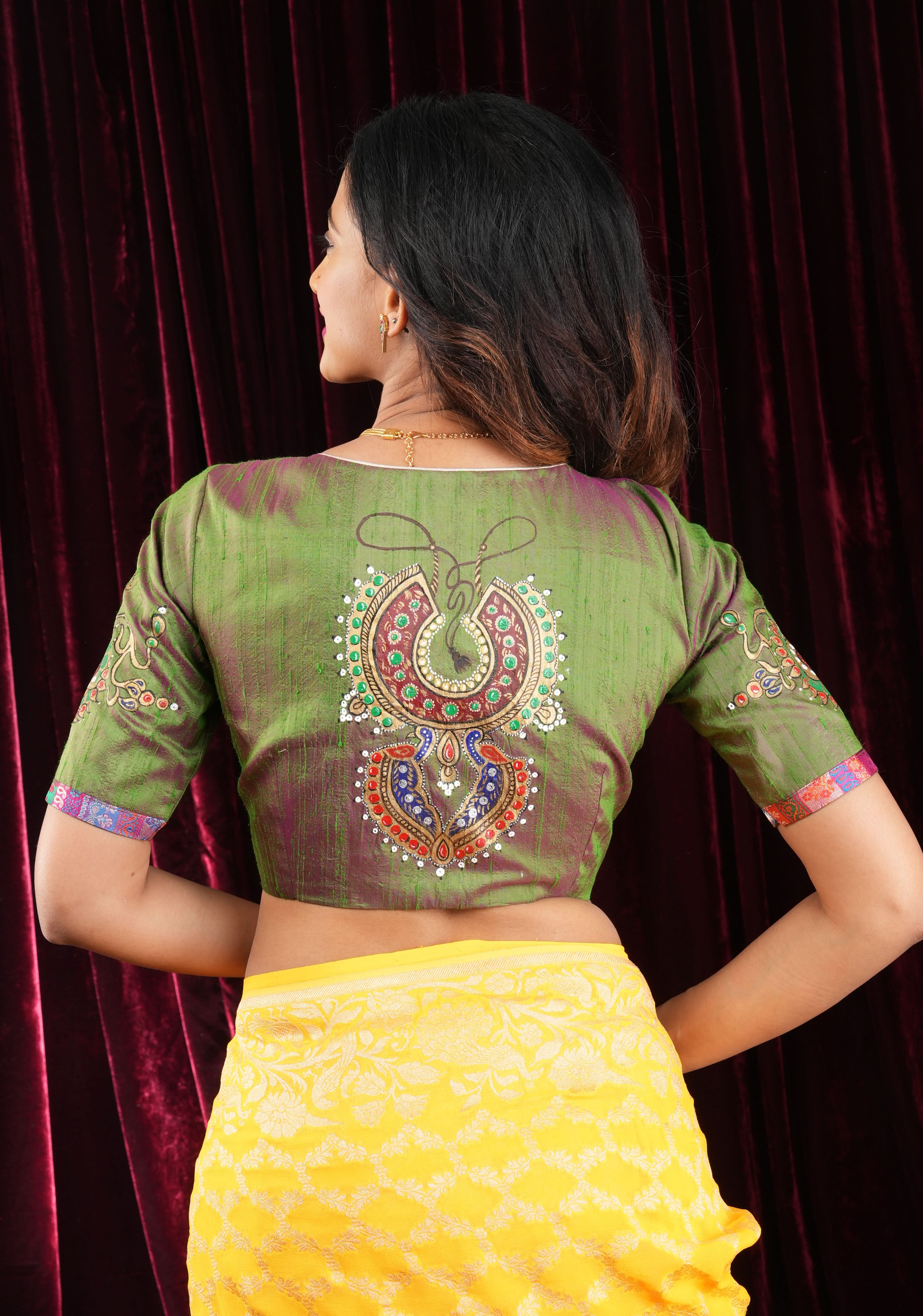 Nizam Jewelry Handpainted Blouse in Green pink Pure Raw silk with multicolor brocade bustier detailing | Shobitam