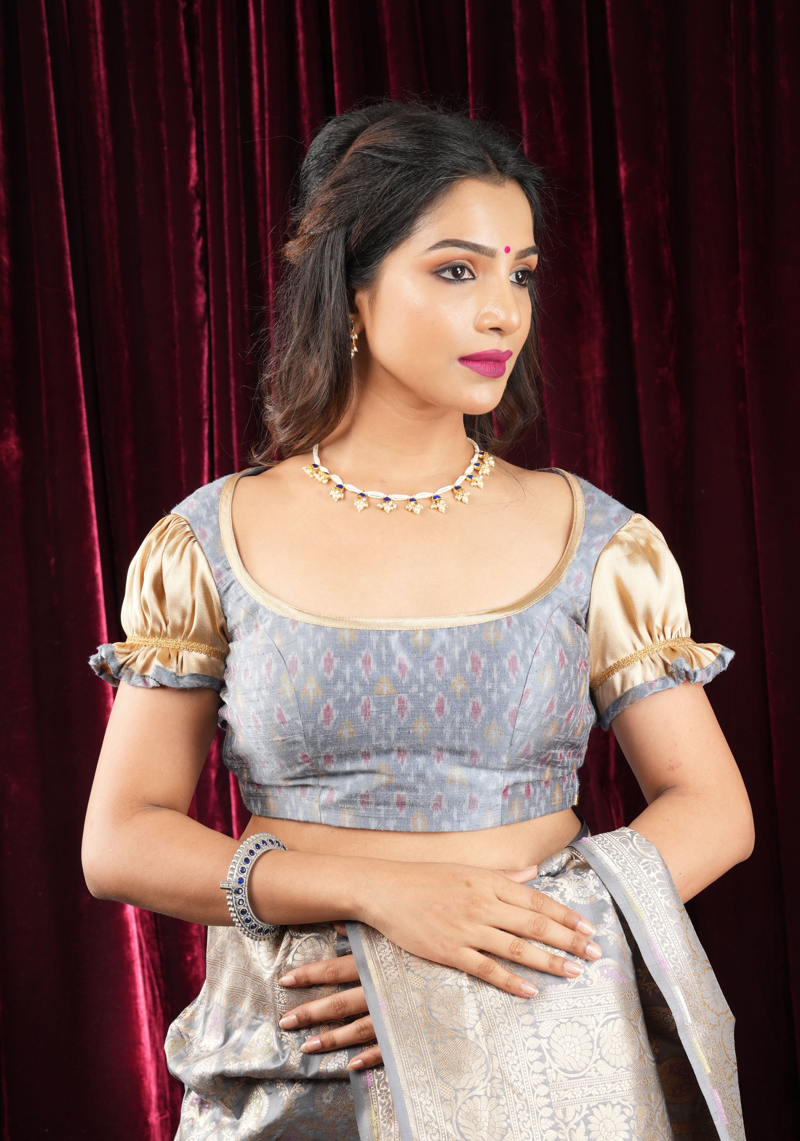 Gray Pure Ikkat Raw Silk Blouse with scoop neck and Gold Puff Sleeves | Shobitam