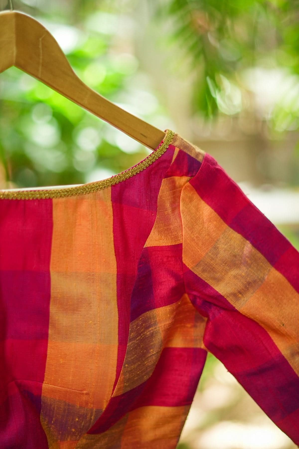Orange reddish pink checked pure rawsilk boatneck blouse | Shobitam