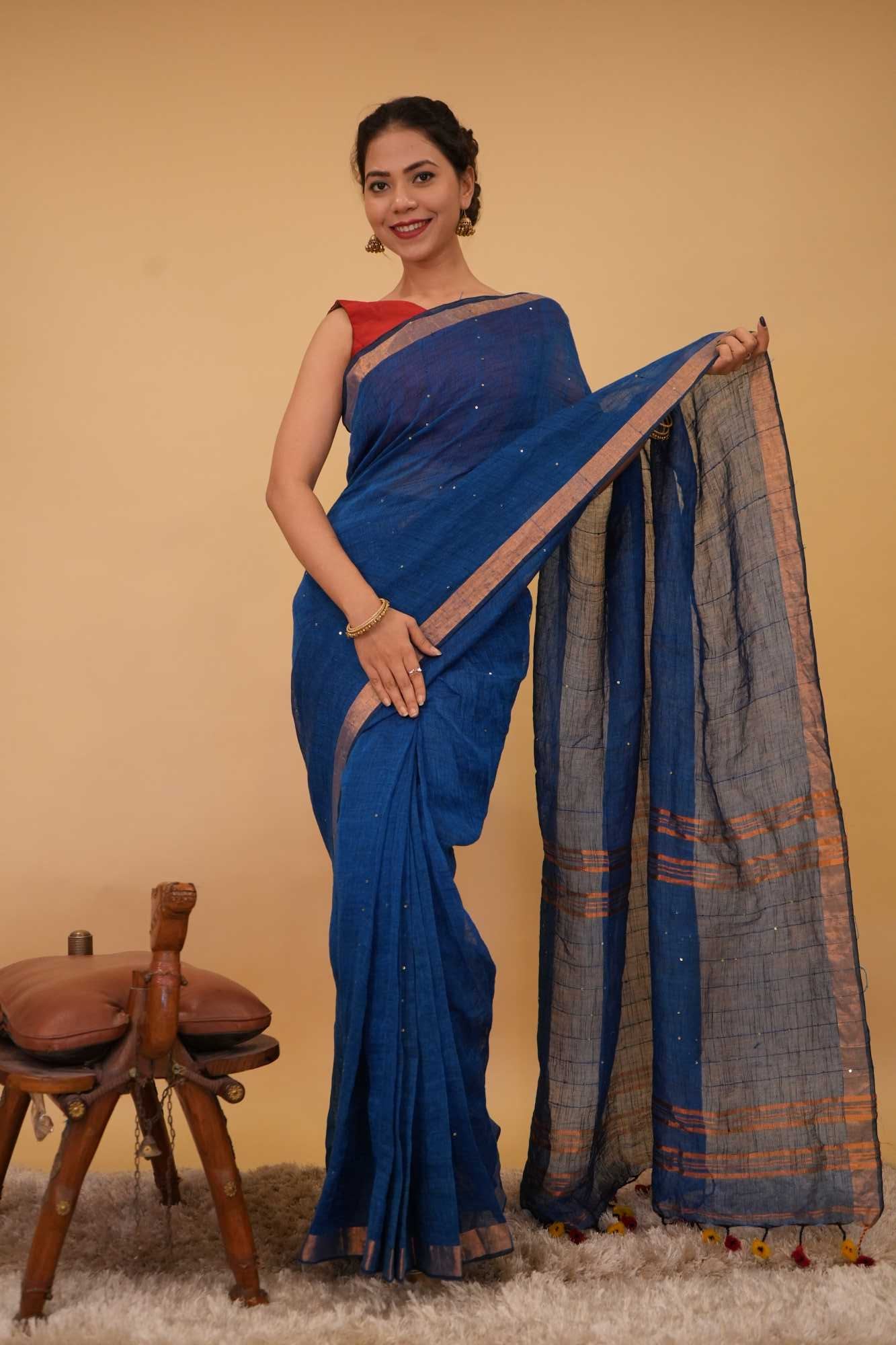 Handloom cotton linen interwoven sequins with tassels in pallu ready to wear saree