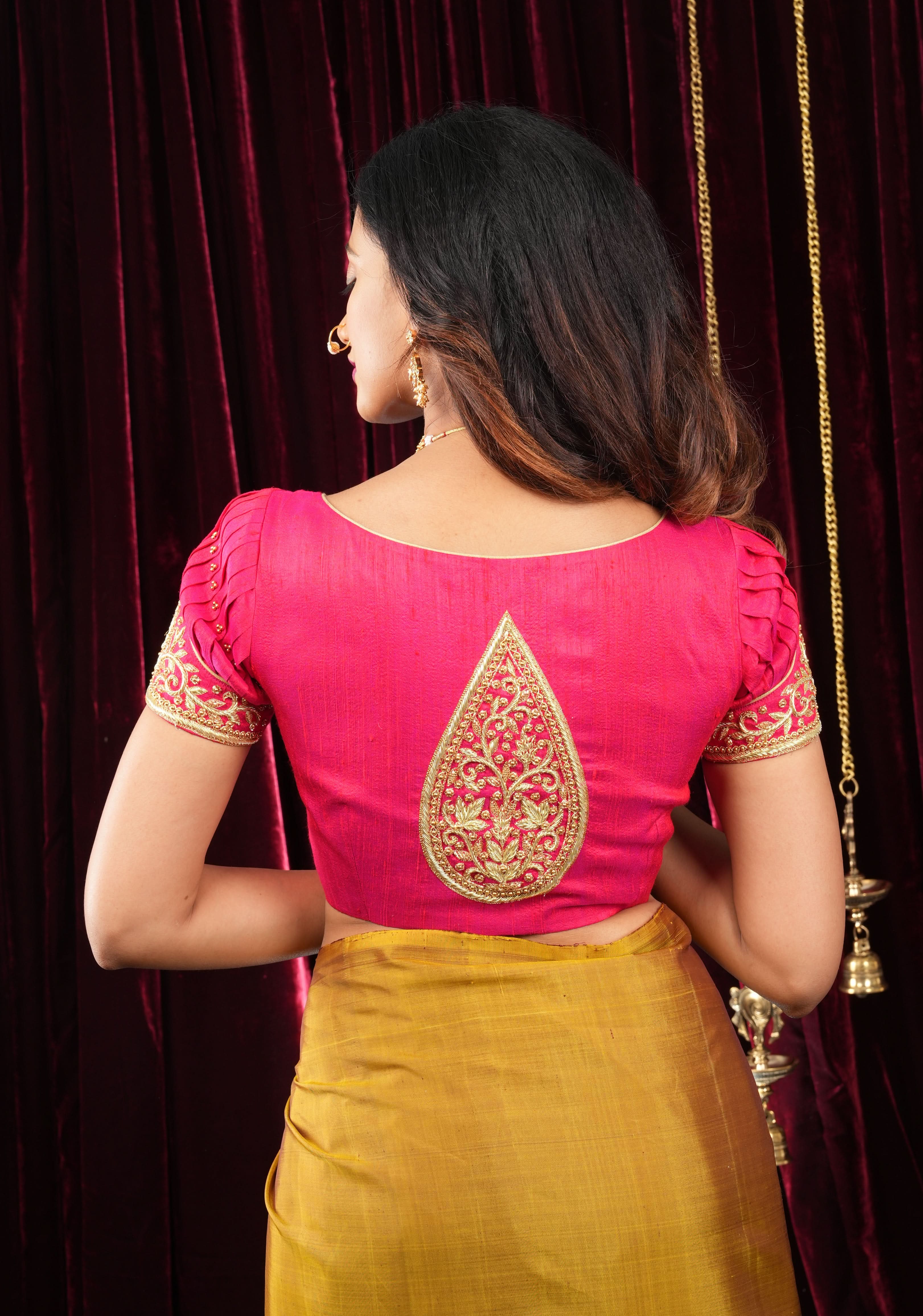 Rani Pink Pure Raw Silk Blouse with Pleated Puff Sleeves and Zardosi Detailing on sleeves and back | Shobitam