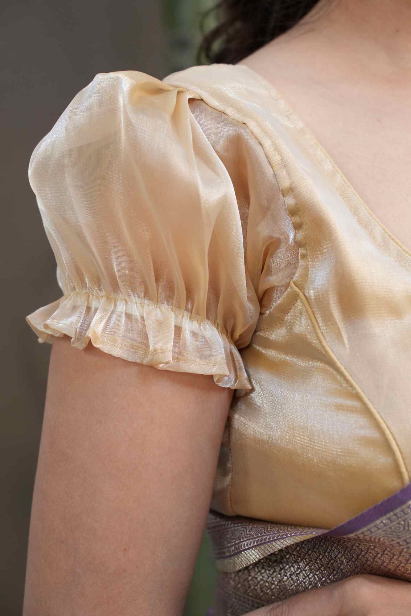 Beautiful Organza Golden  With princess Cut Piping Finished  & Padded  Blouse