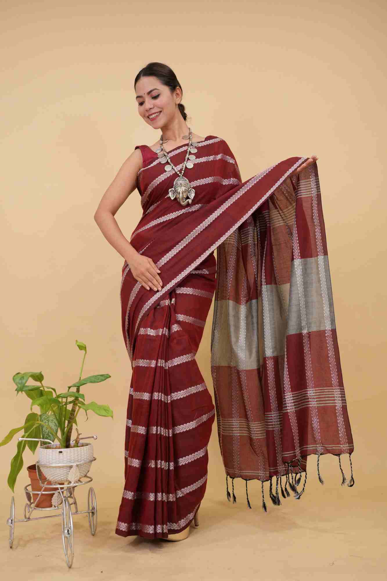 Traditional Naksha Weave  Red Maroon With Silver Thread Overall With Tassels On Pallu Pre Drape Saree