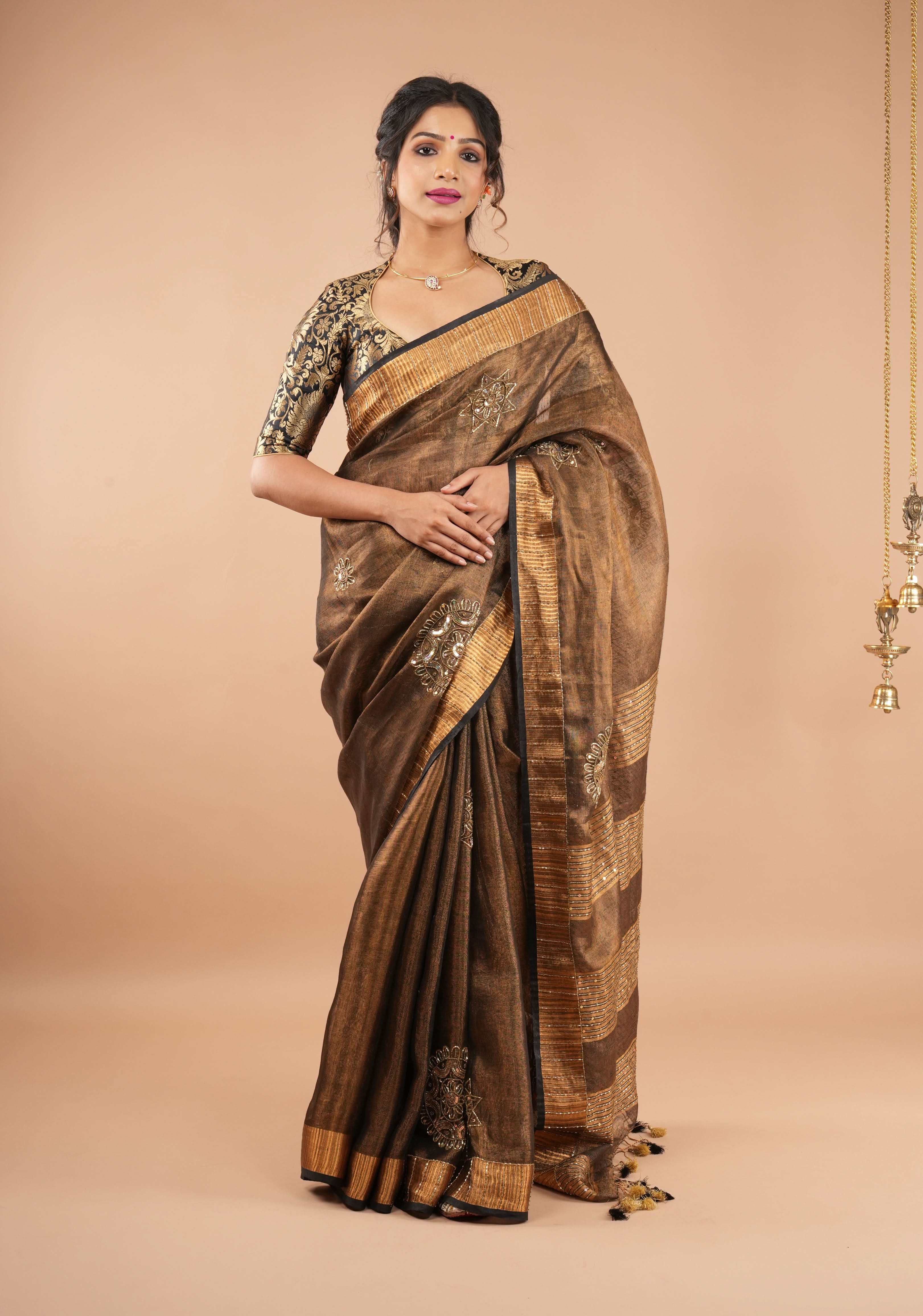 Embroidery cut dana with seqins Work Tissue Linen Saree in copper black with dramatic work Pallu | Shobitam