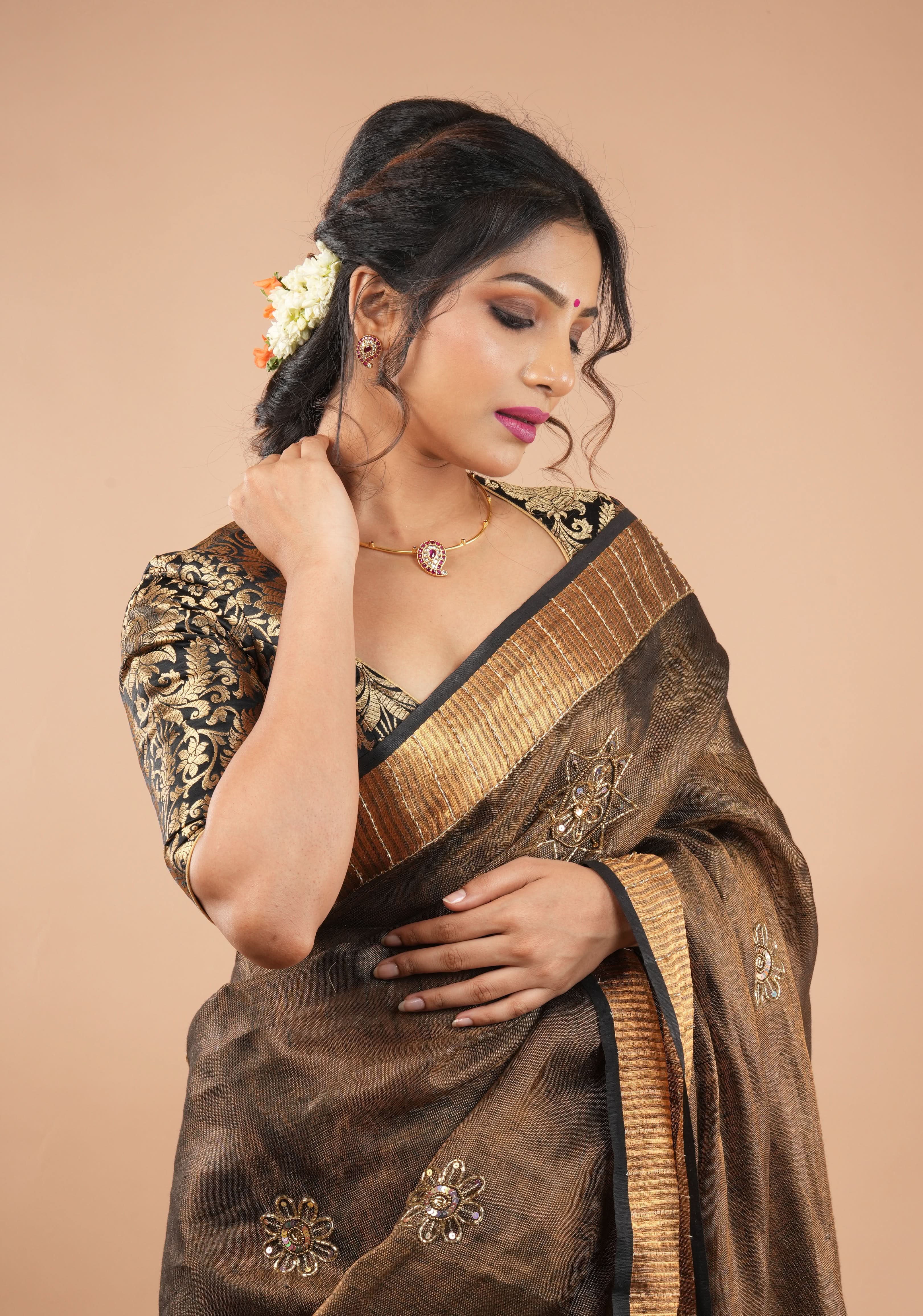 Embroidery cut dana with seqins Work Tissue Linen Saree in copper black with dramatic work Pallu | Shobitam