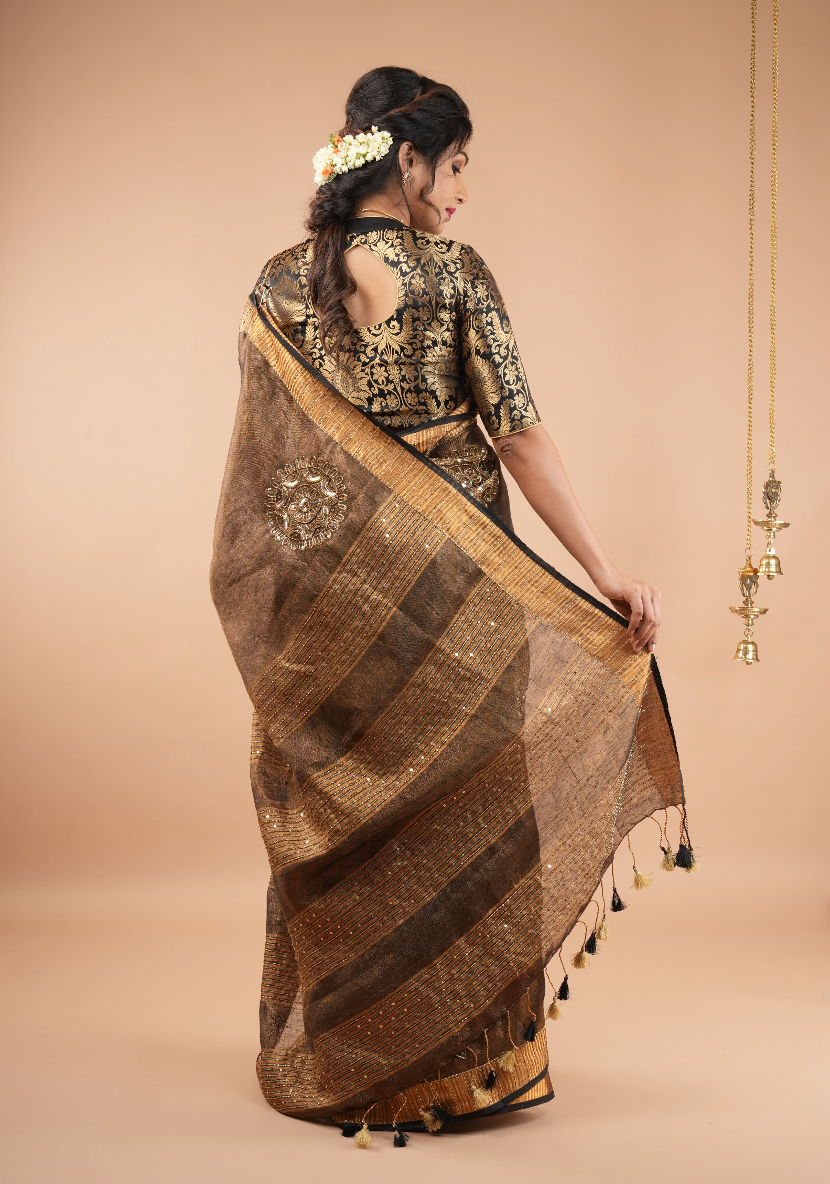 Embroidery cut dana with seqins Work Tissue Linen Saree in copper black with dramatic work Pallu | Shobitam