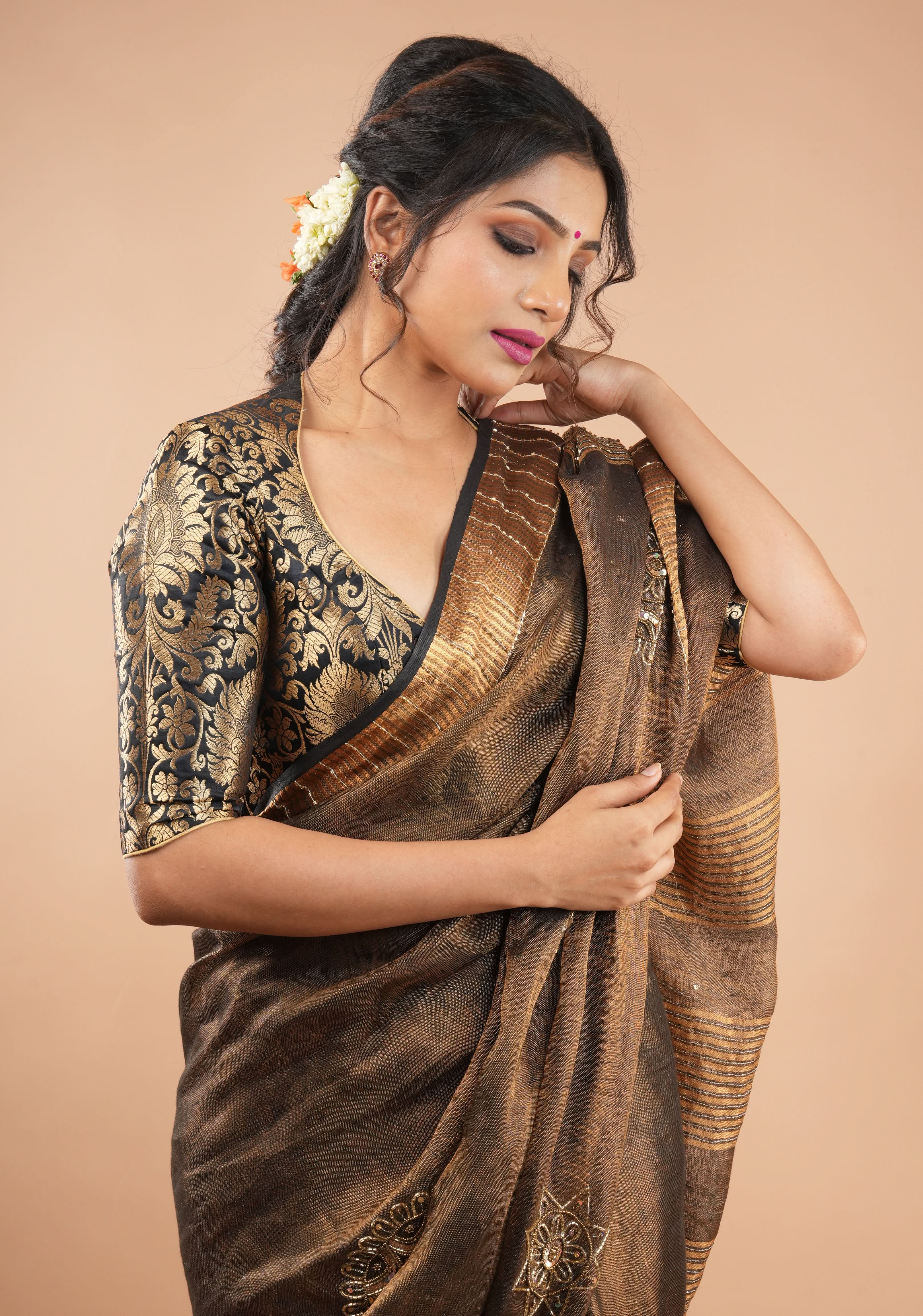 Embroidery cut dana with seqins Work Tissue Linen Saree in copper black with dramatic work Pallu | Shobitam