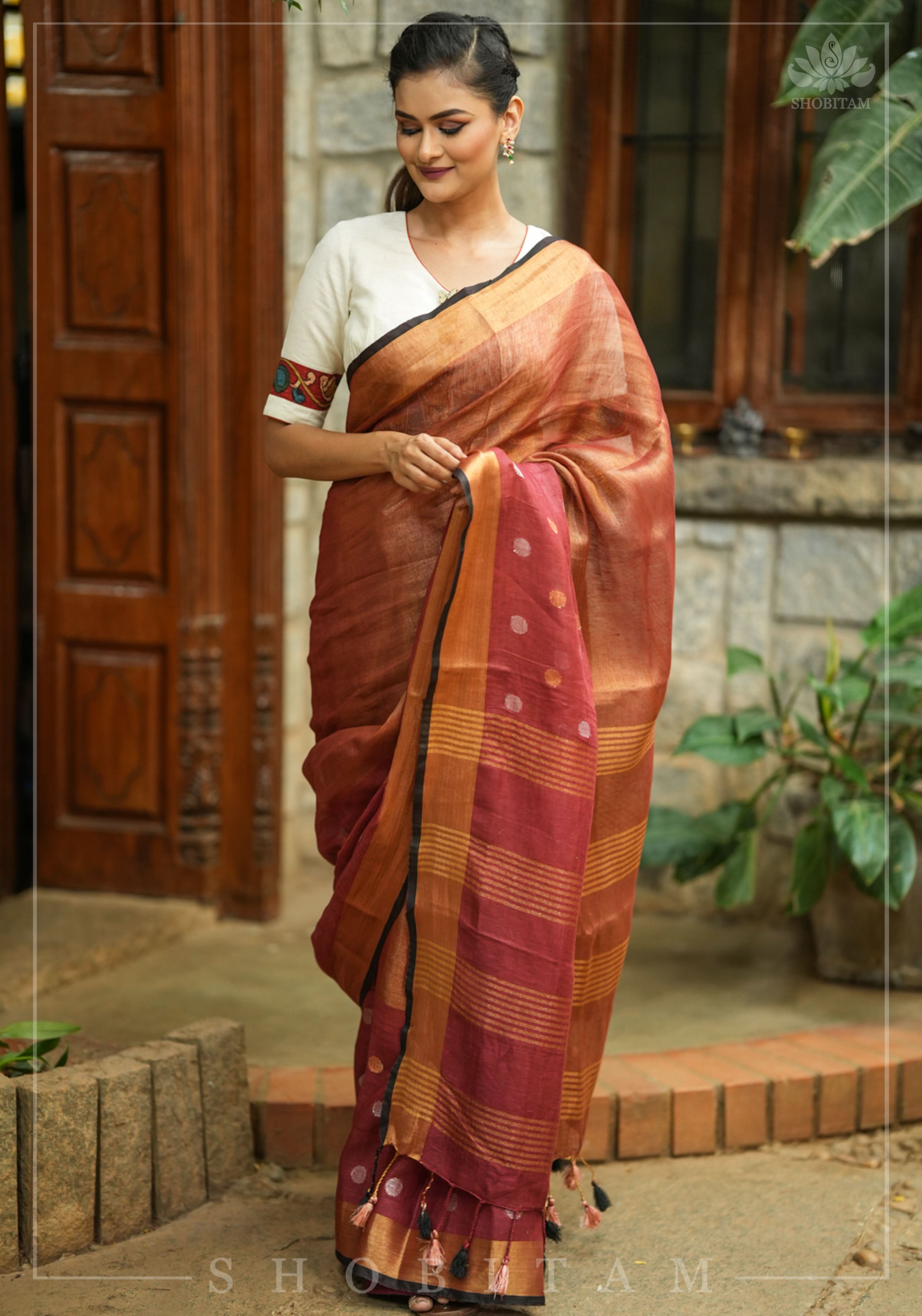 Maroon Tissue Body Linen Saree in Muted Antique Gold with Sona Rupa Polka Dots Skirt Border | Shobitam