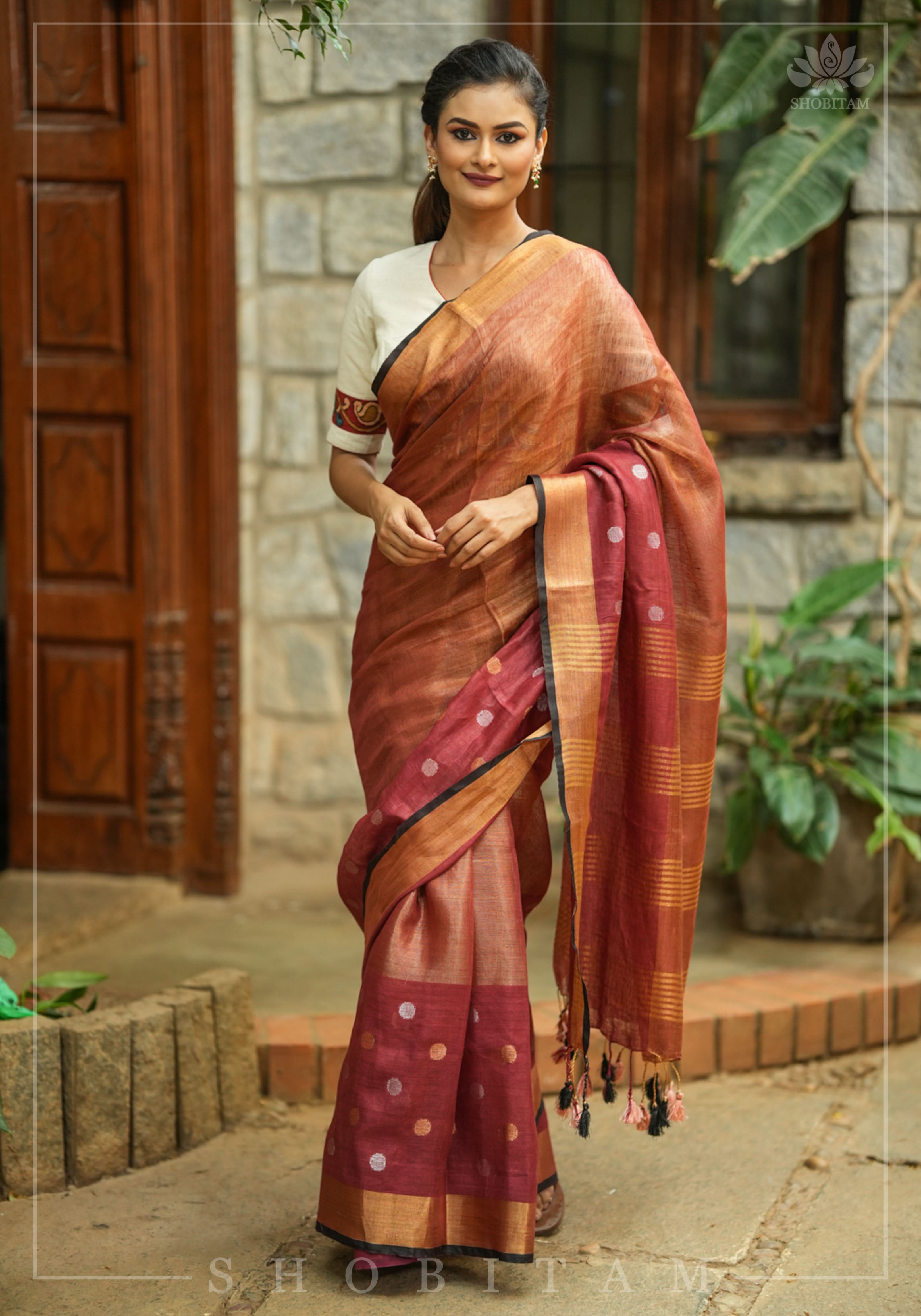 Maroon Tissue Body Linen Saree in Muted Antique Gold with Sona Rupa Polka Dots Skirt Border | Shobitam