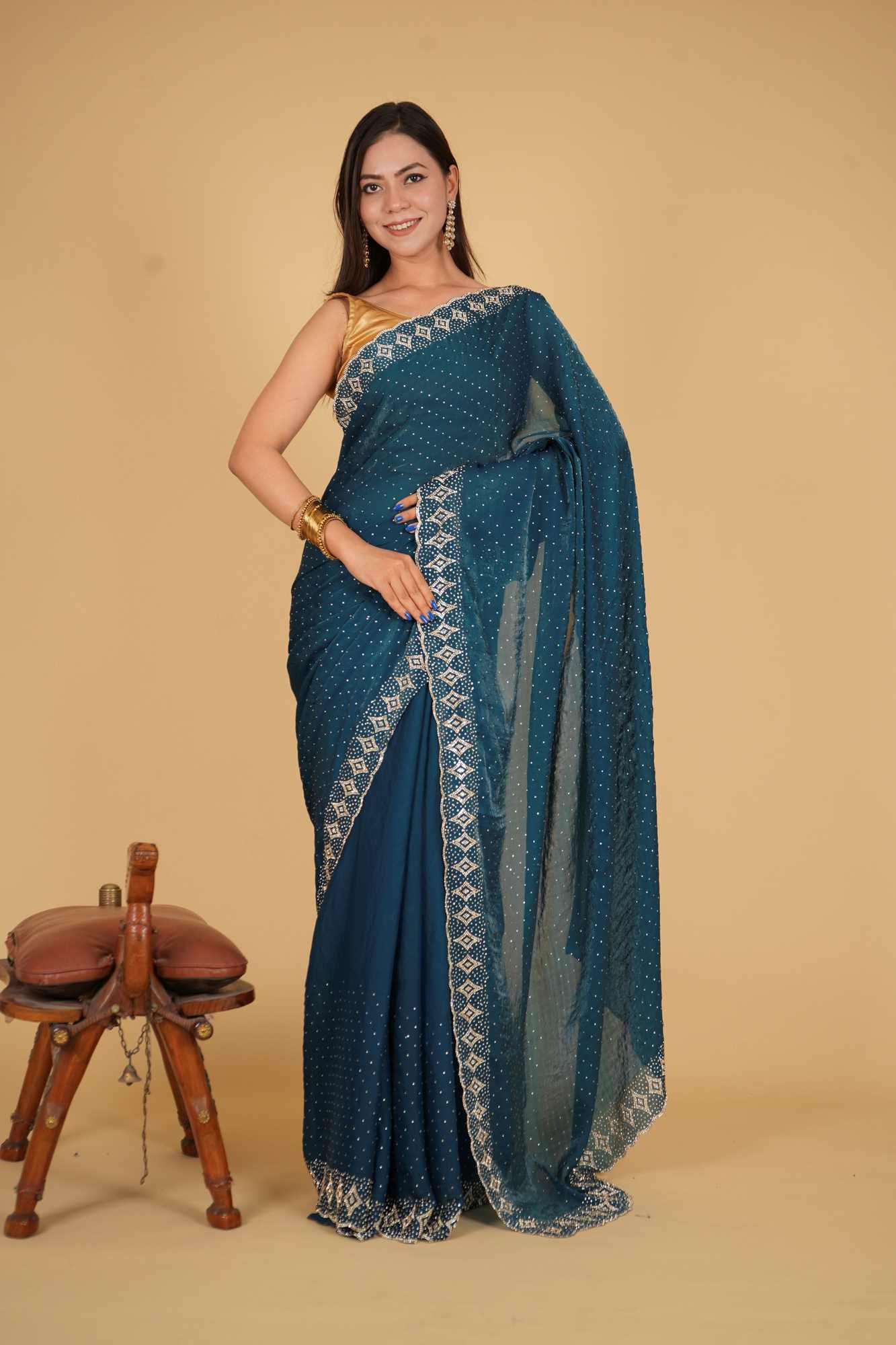 Party Style Soft Chiffon silk With Stone Embellished Overall And Detail Border Pre Drape Saree