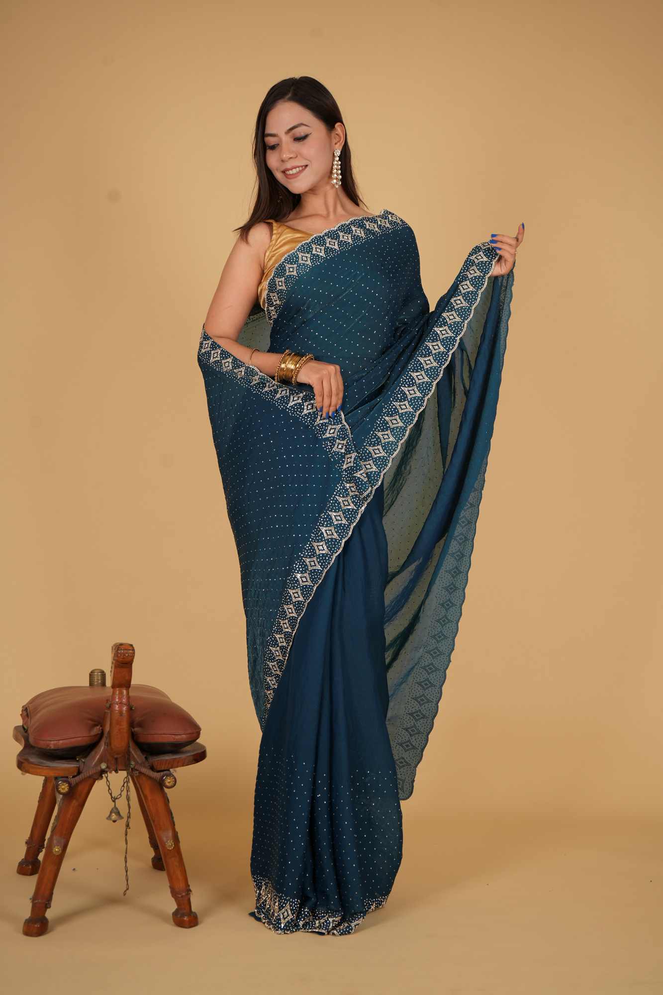 Party Style Soft Chiffon silk With Stone Embellished Overall And Detail Border Pre Drape Saree