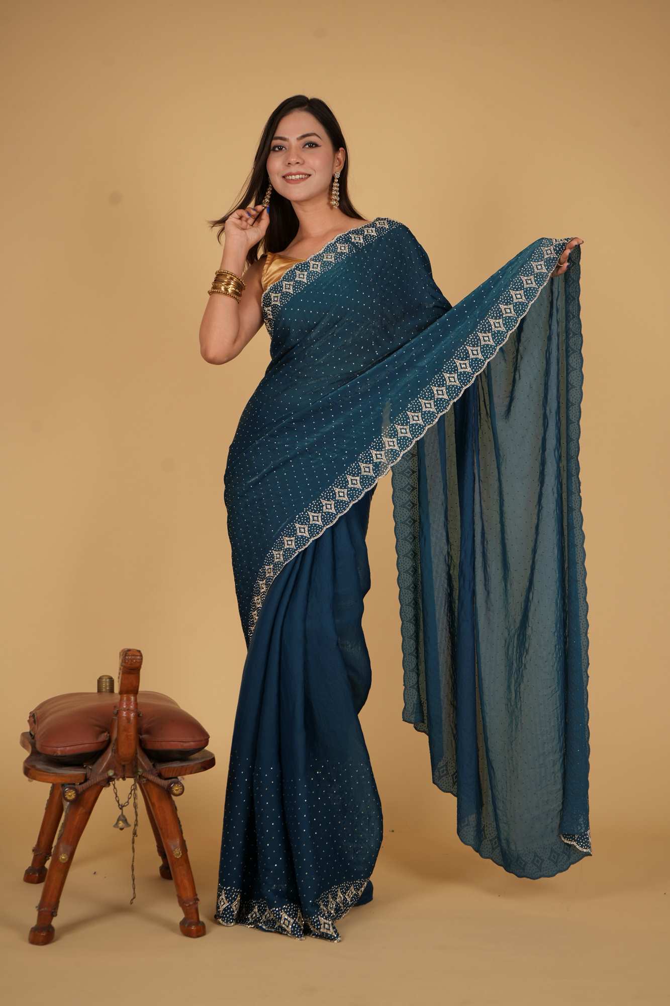 Party Style Soft Chiffon silk With Stone Embellished Overall And Detail Border Pre Drape Saree