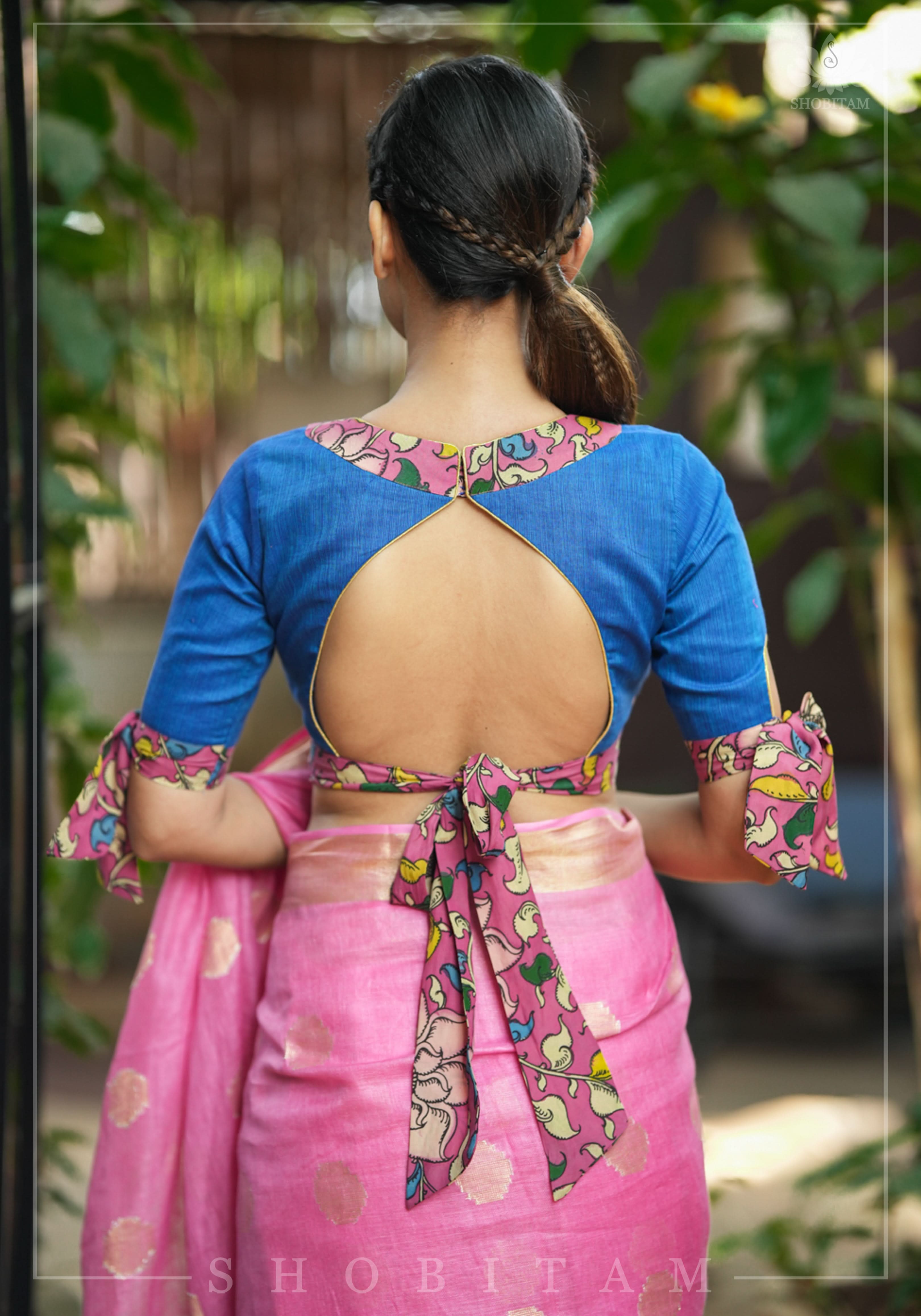 Ocean blue handloom V neck blouse with rose pink handpainted kalamkari border detailing. | Shobitam