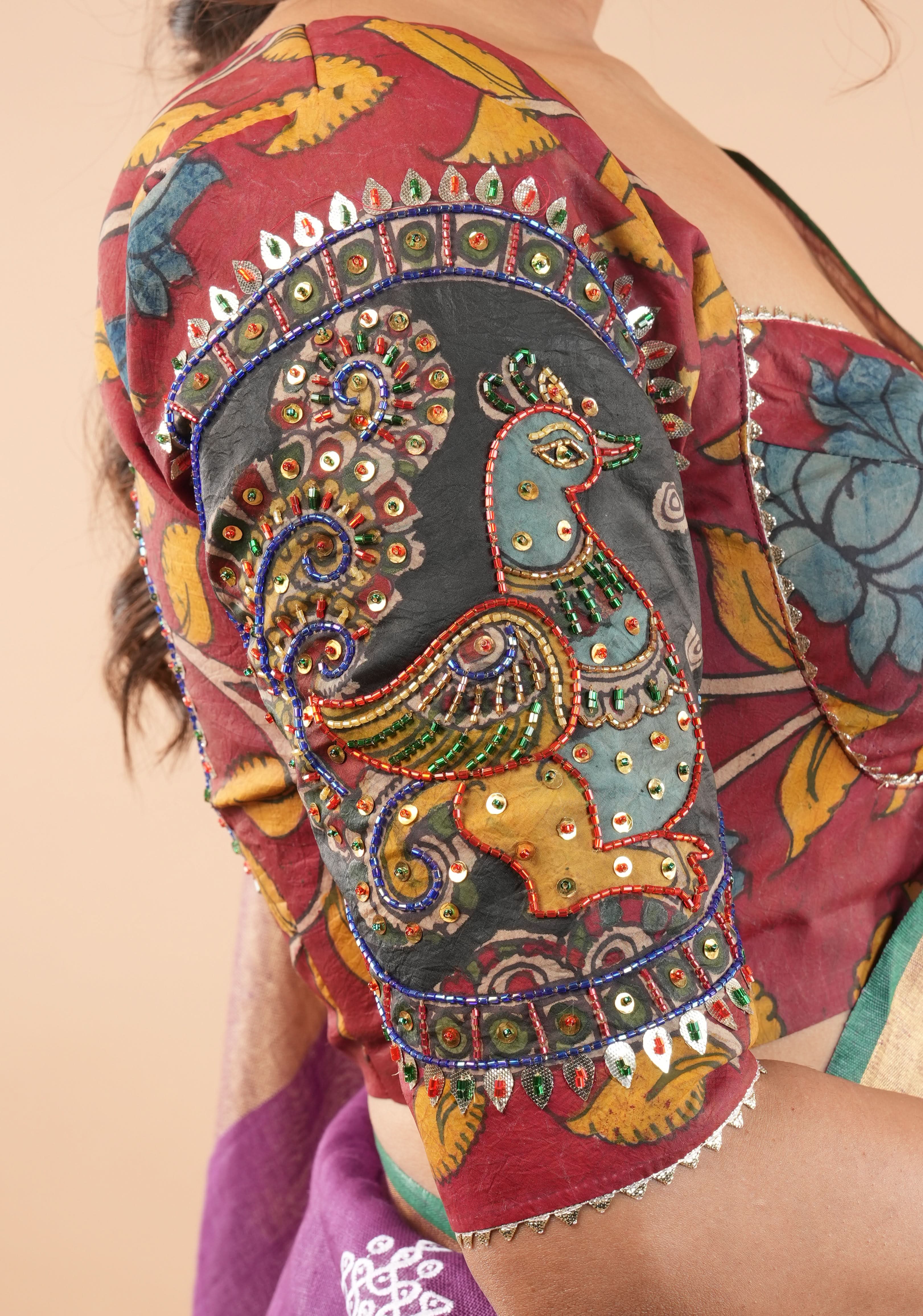 Red Kalamkari blouse with peacock designs, and cutdana, gotta and sequins handwork | Shobitam