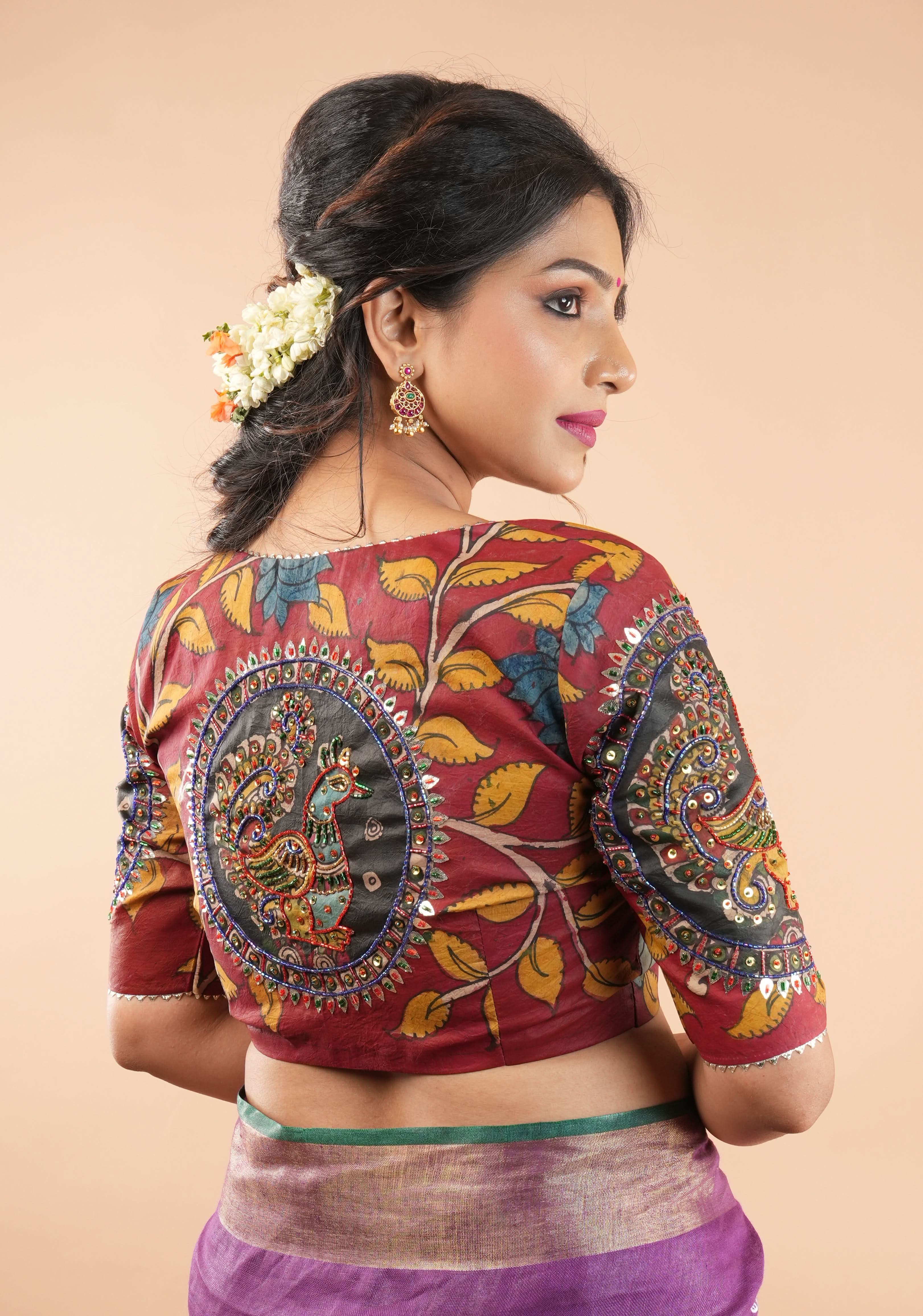 Red Kalamkari blouse with peacock designs, and cutdana, gotta and sequins handwork | Shobitam