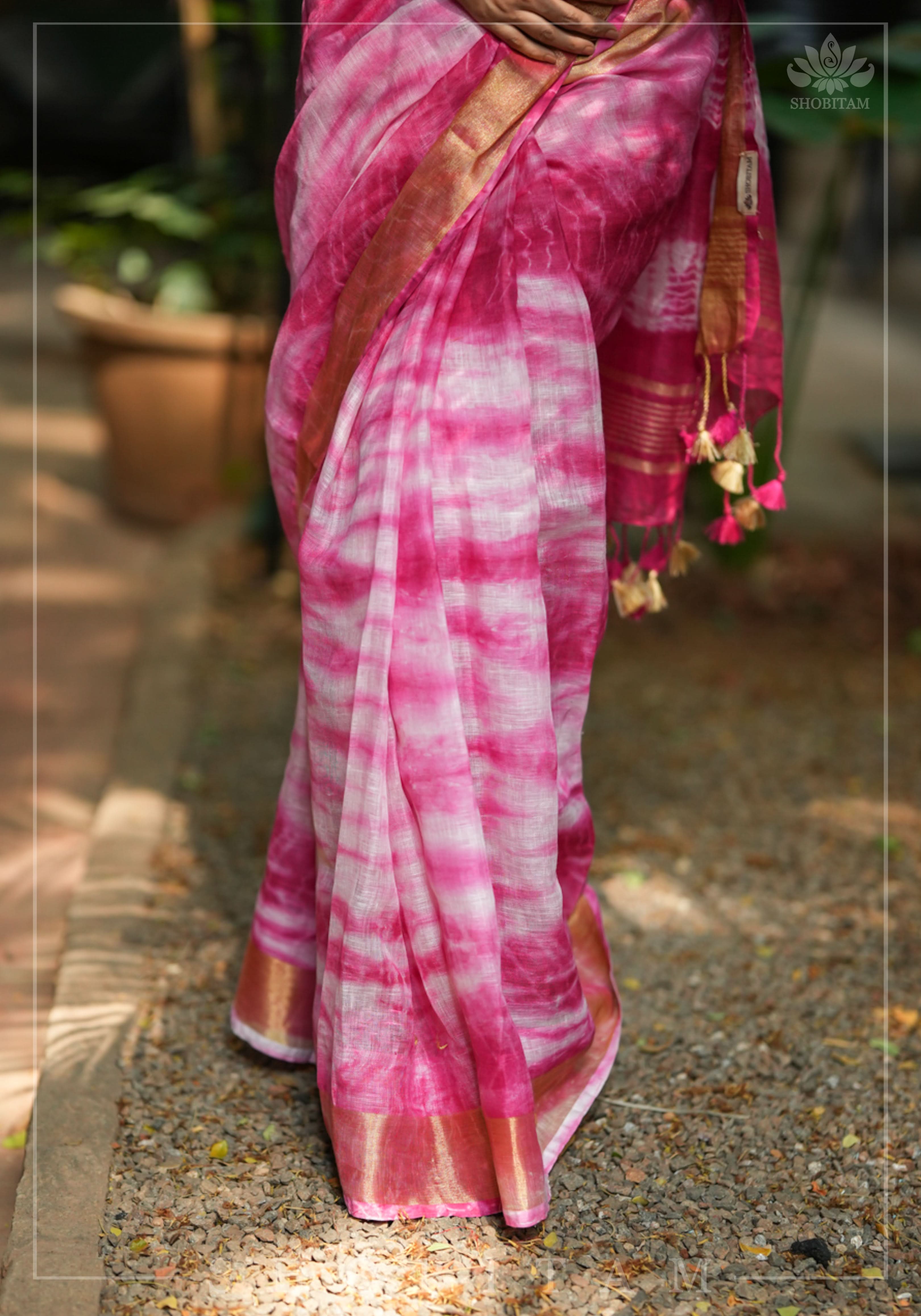Handmade Shibori Dye Pure Linen by Linen Saree in Amaranth Pink and White with long tassels | Shobitam