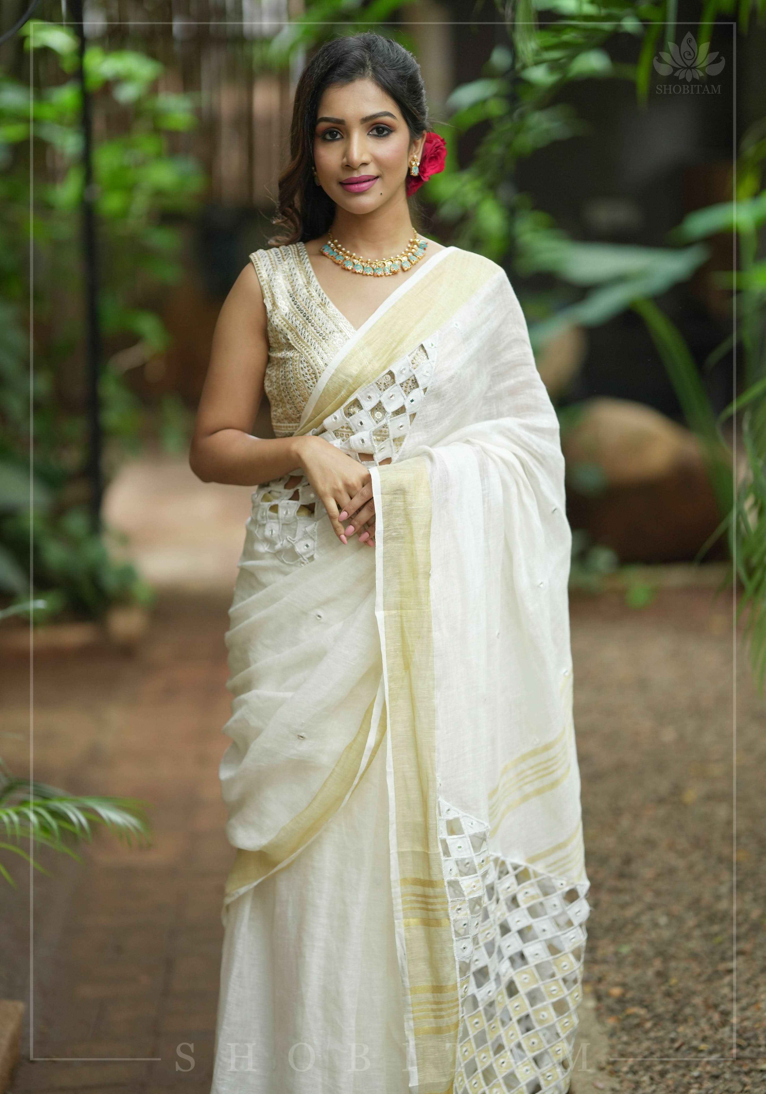 Cutwork and Mirror Work Linen by Line Saree in Chalk White | Shobitam