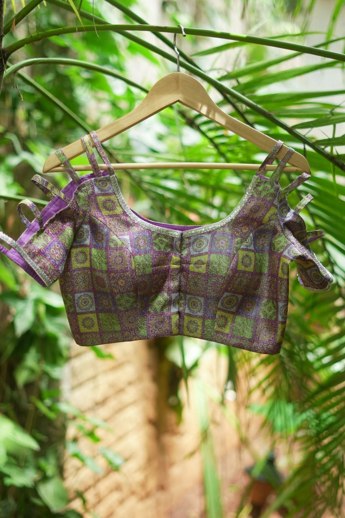 Multicolor Printed Blouse on Lavender Base with multi-strapped sleeves | Shobitam