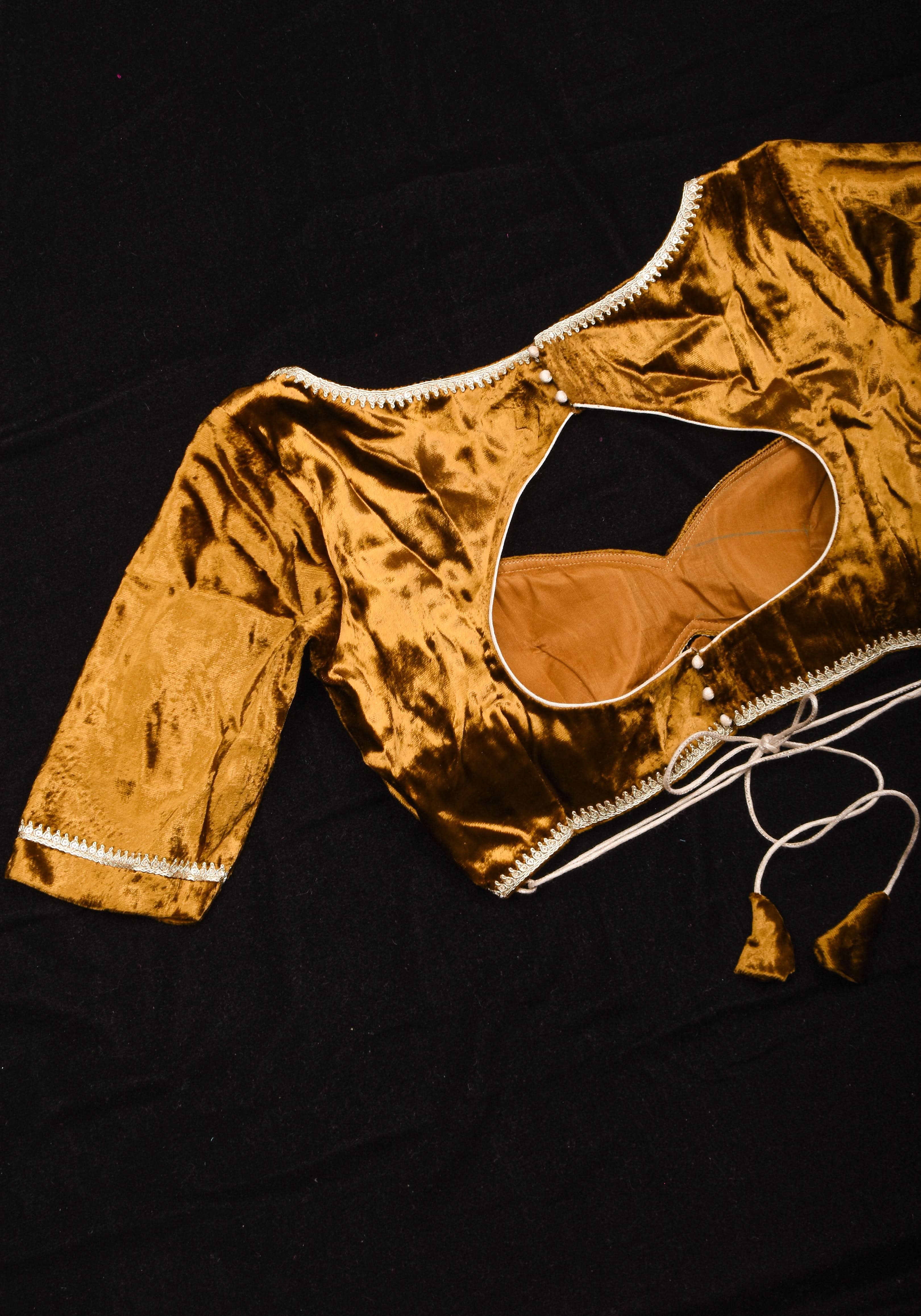 Exquisite Amber Brown Velvet Blouse with Deep Sweet Heart Neck and Tie up Detailing | Shobitam