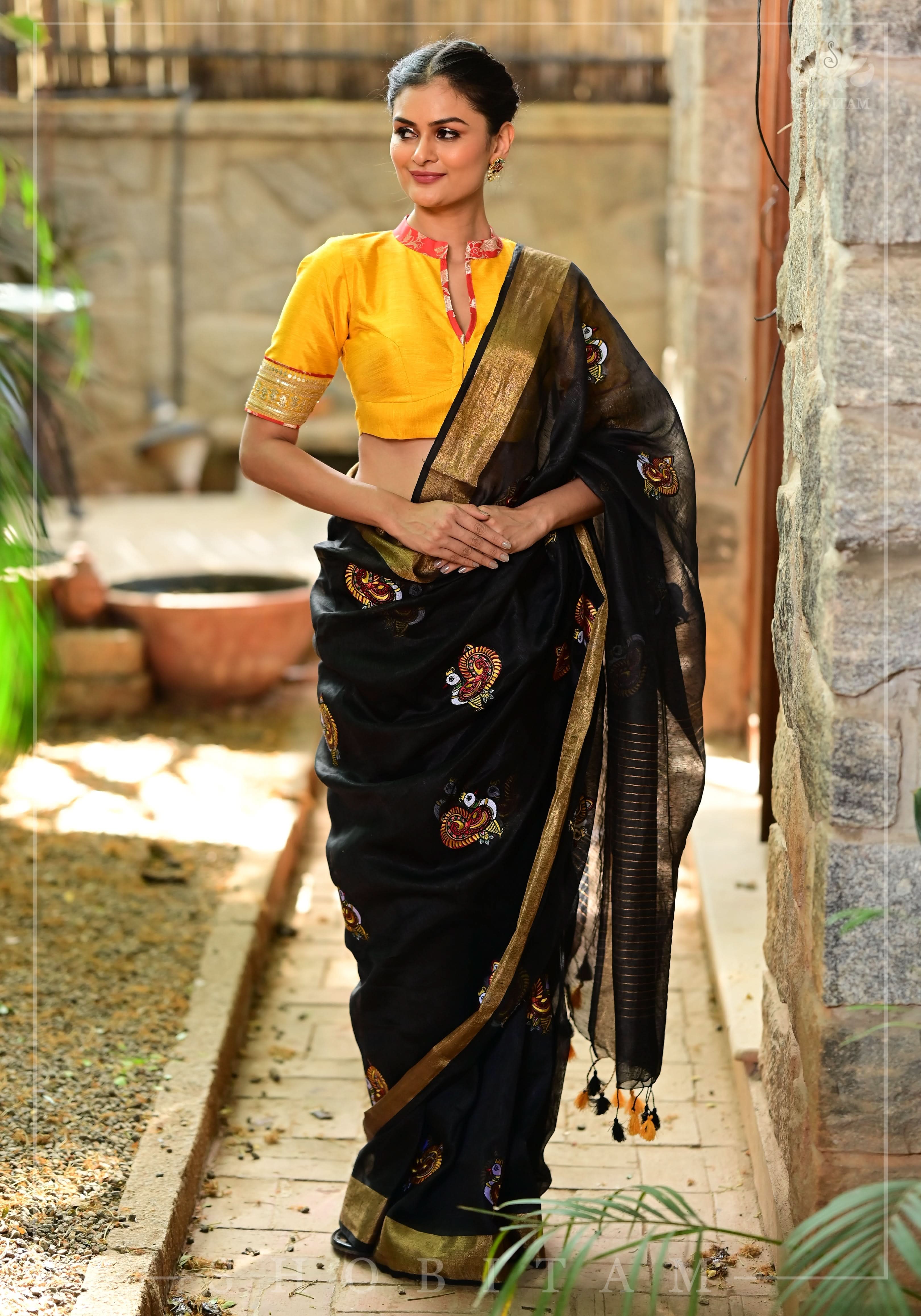 Annapakshi -the divine Swan embroidered motifs on Black Silk Linen Saree | Shobitam