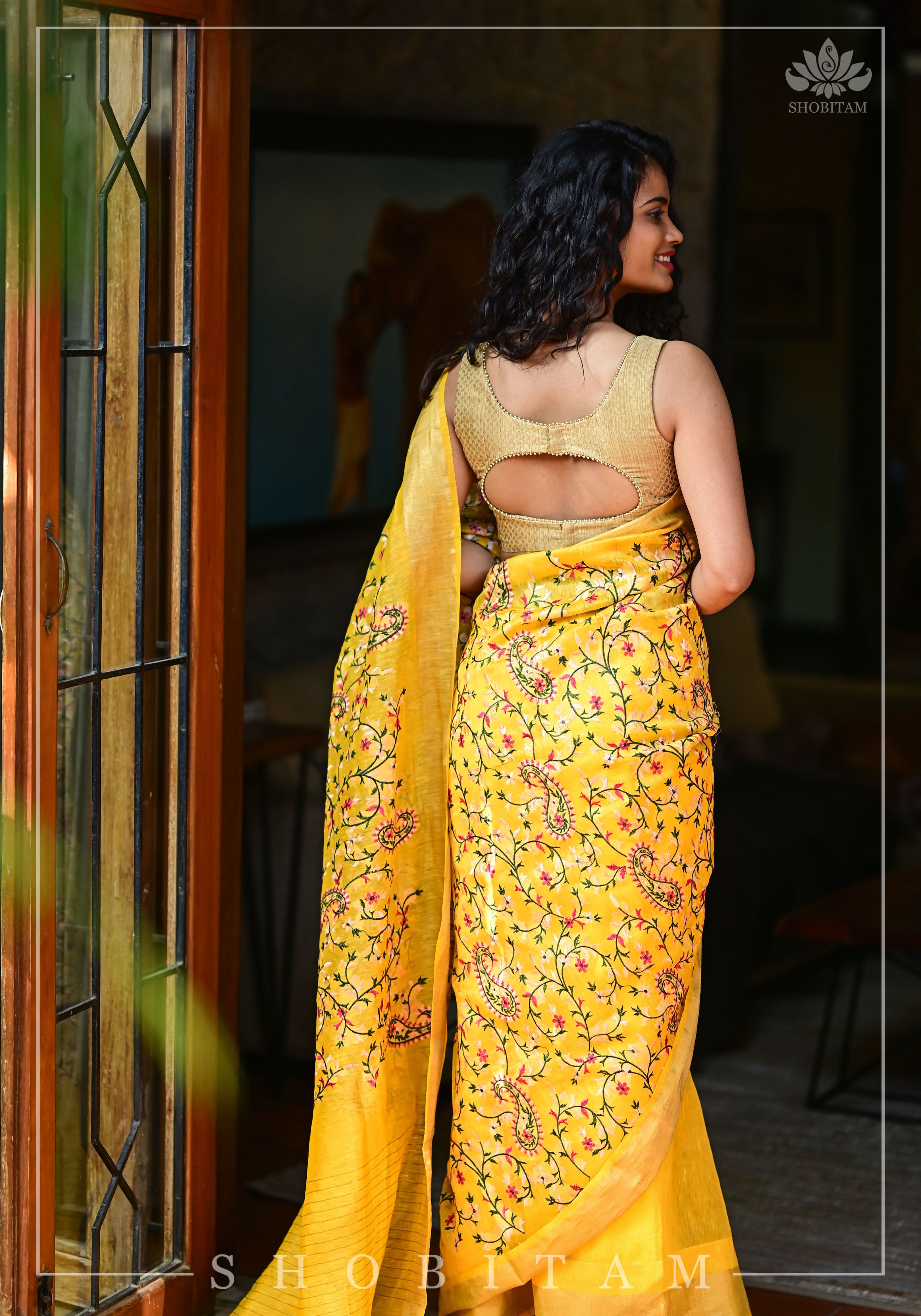 Silk Linen Saree in Yellow with Floral Half Jaal Embroidery | Shobitam