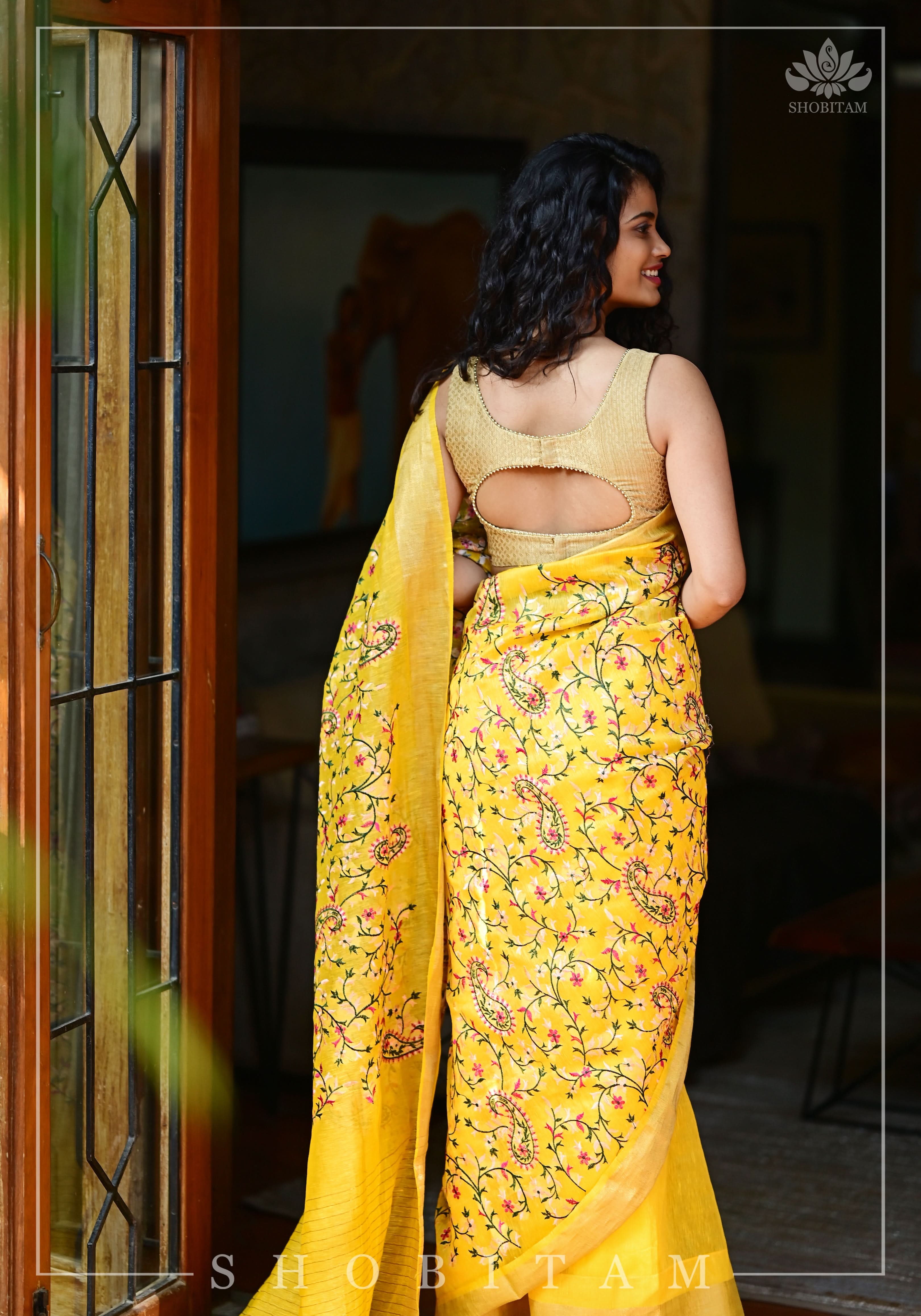 Silk Linen Saree in Yellow with Floral Half Jaal Embroidery | Shobitam