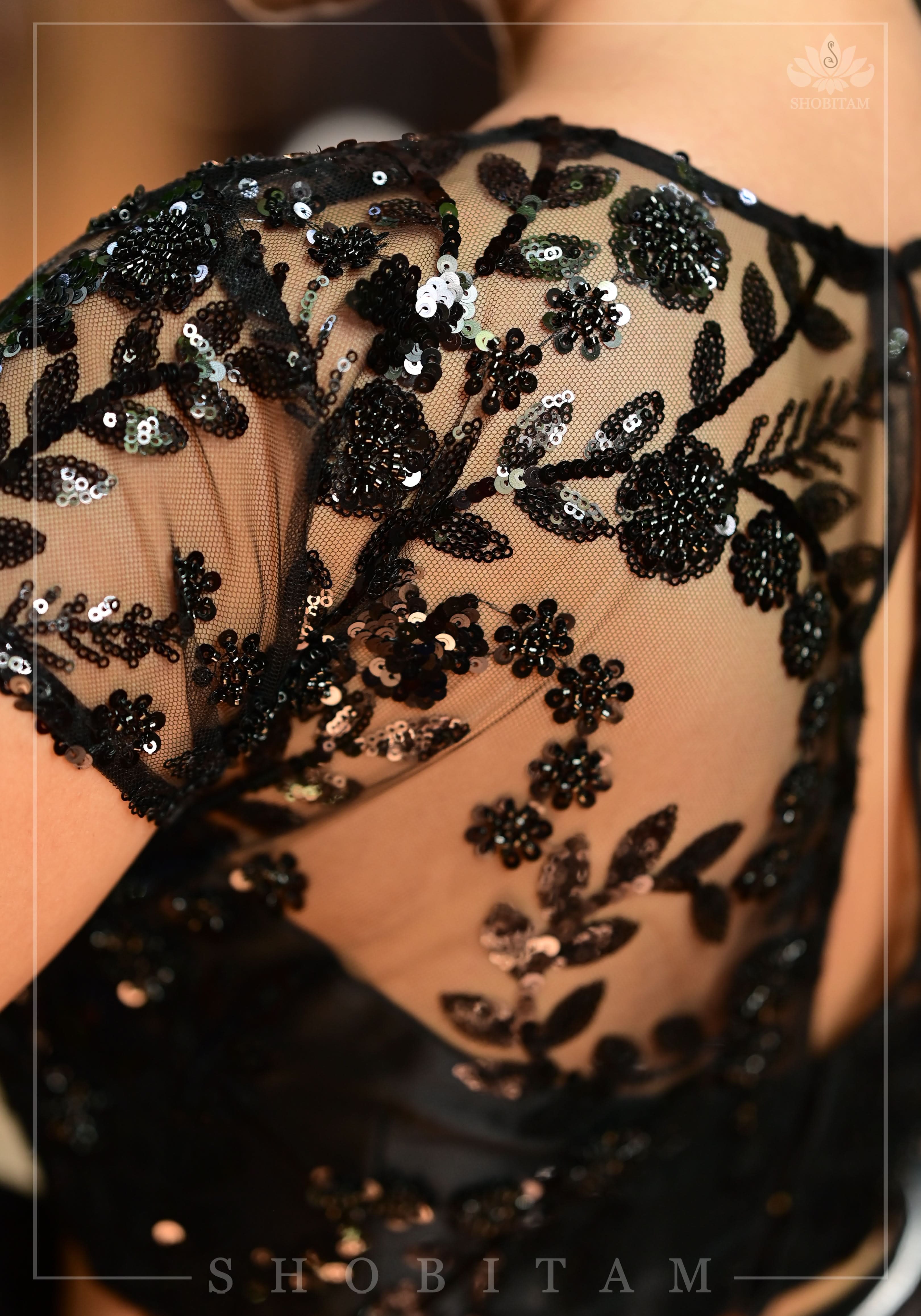 Stunning Black Net Blouse with Sheer Yoke and Shimmering Black Floral Design Sequins | Shobitam