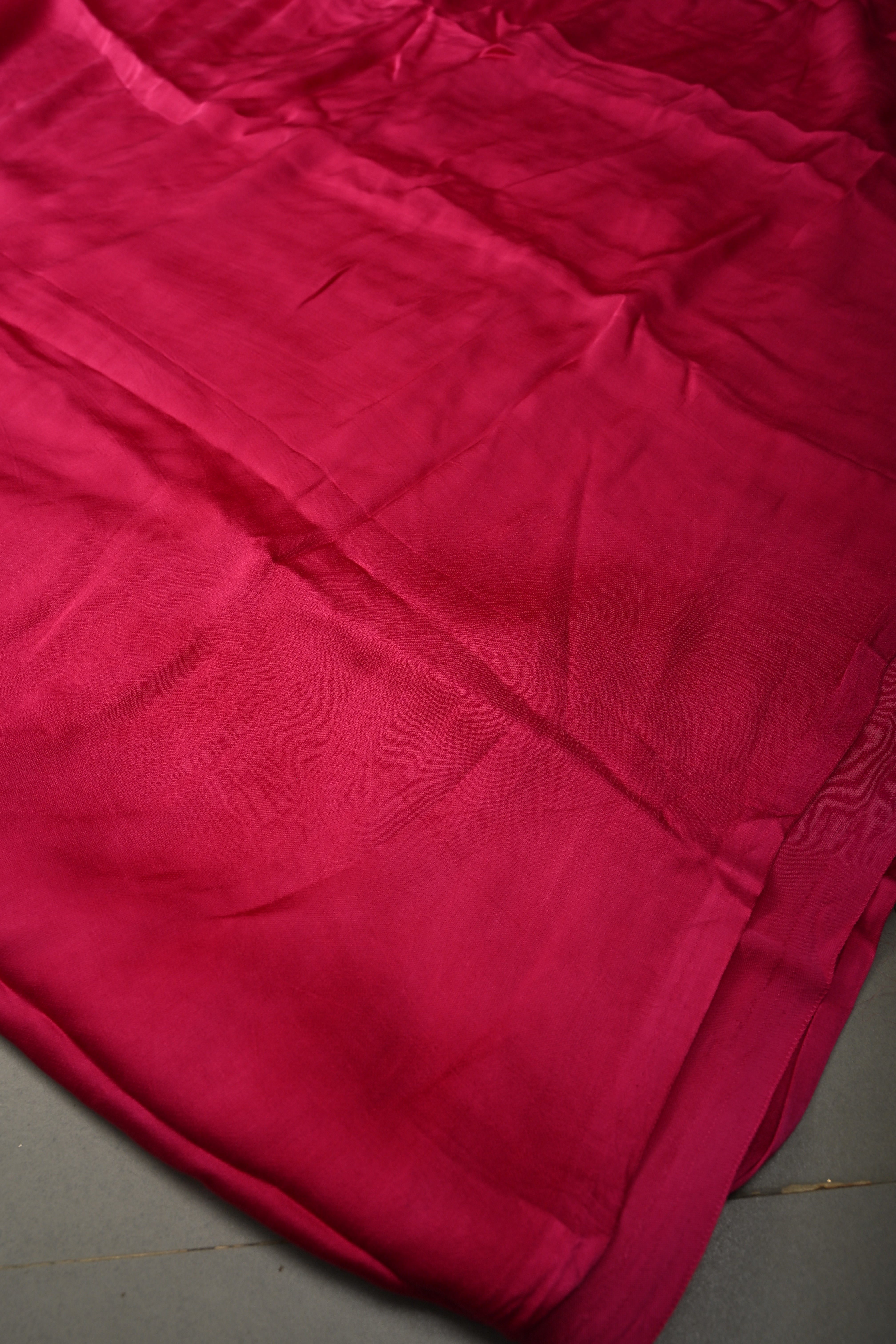 Rani Pink Borderless Modal Silk Saree with Lagda Patta Crushed Tissue Pallu | Shobitam