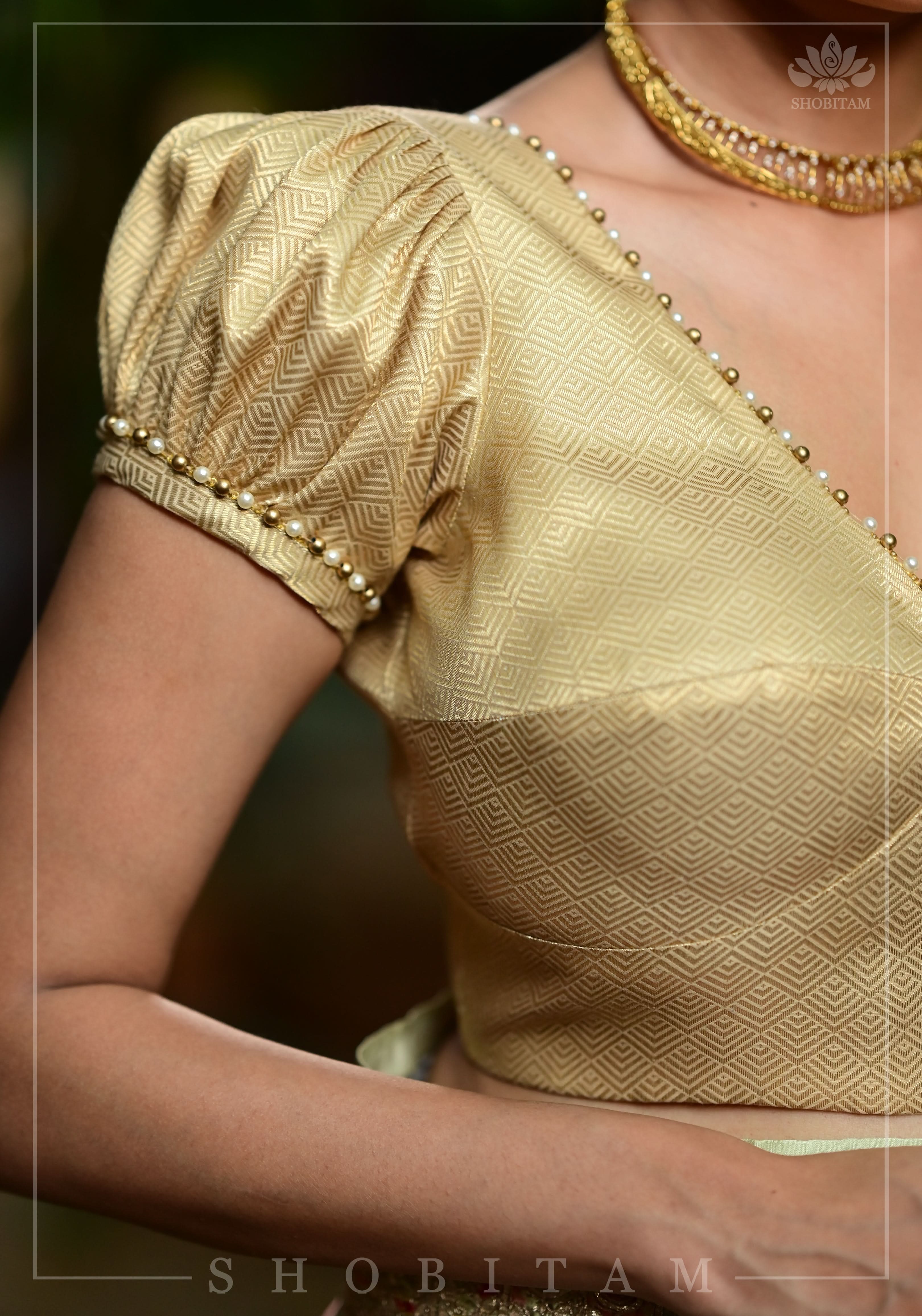 Gold tone sweetheart neck blouse with puff sleeves with beads detailing | Made to Order | Shobitam