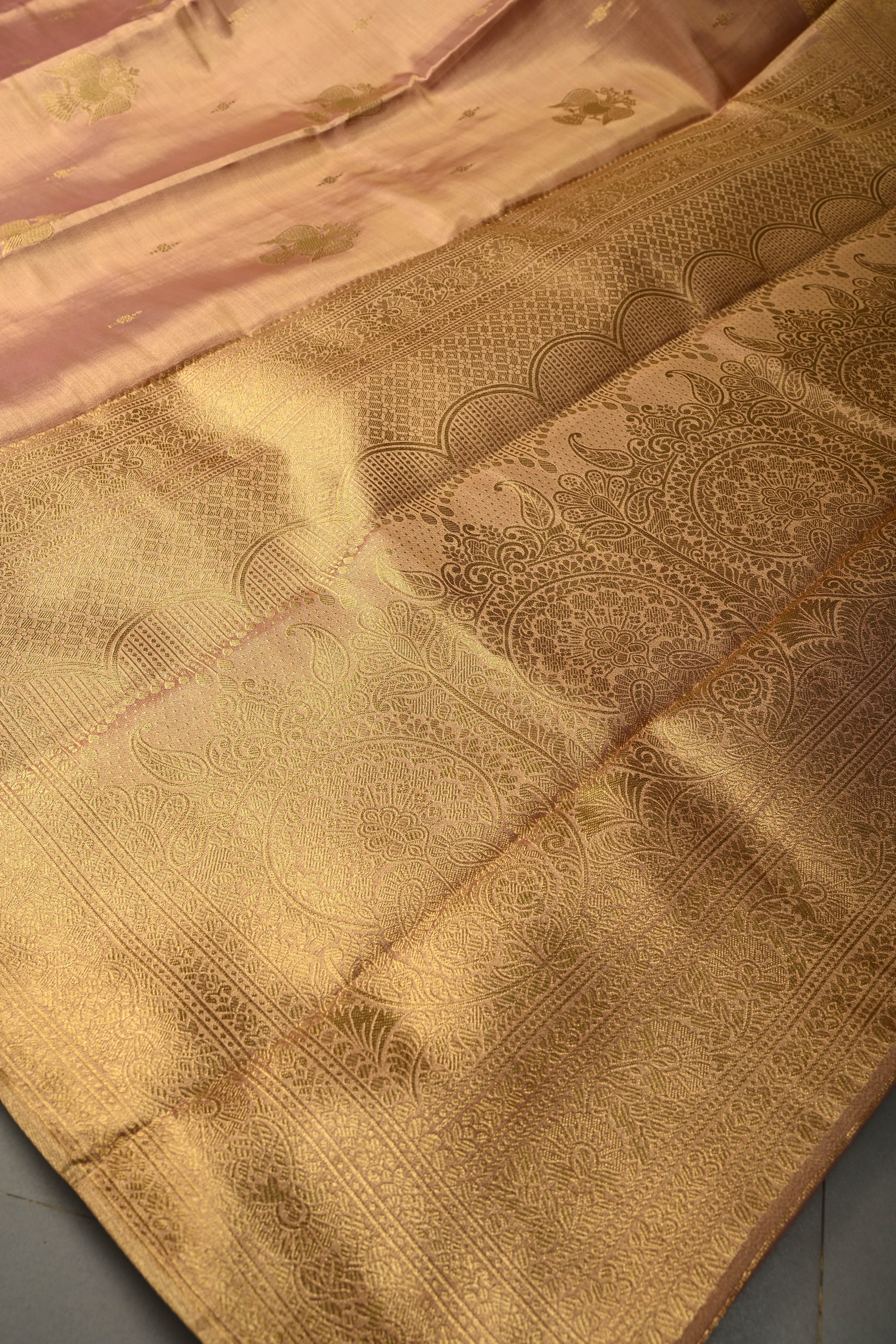 Dusty Pink-Gold Kanchi Tissue Semi Silk Saree with Gandaberunda Zari Buttas and Zari Border | Shobitam