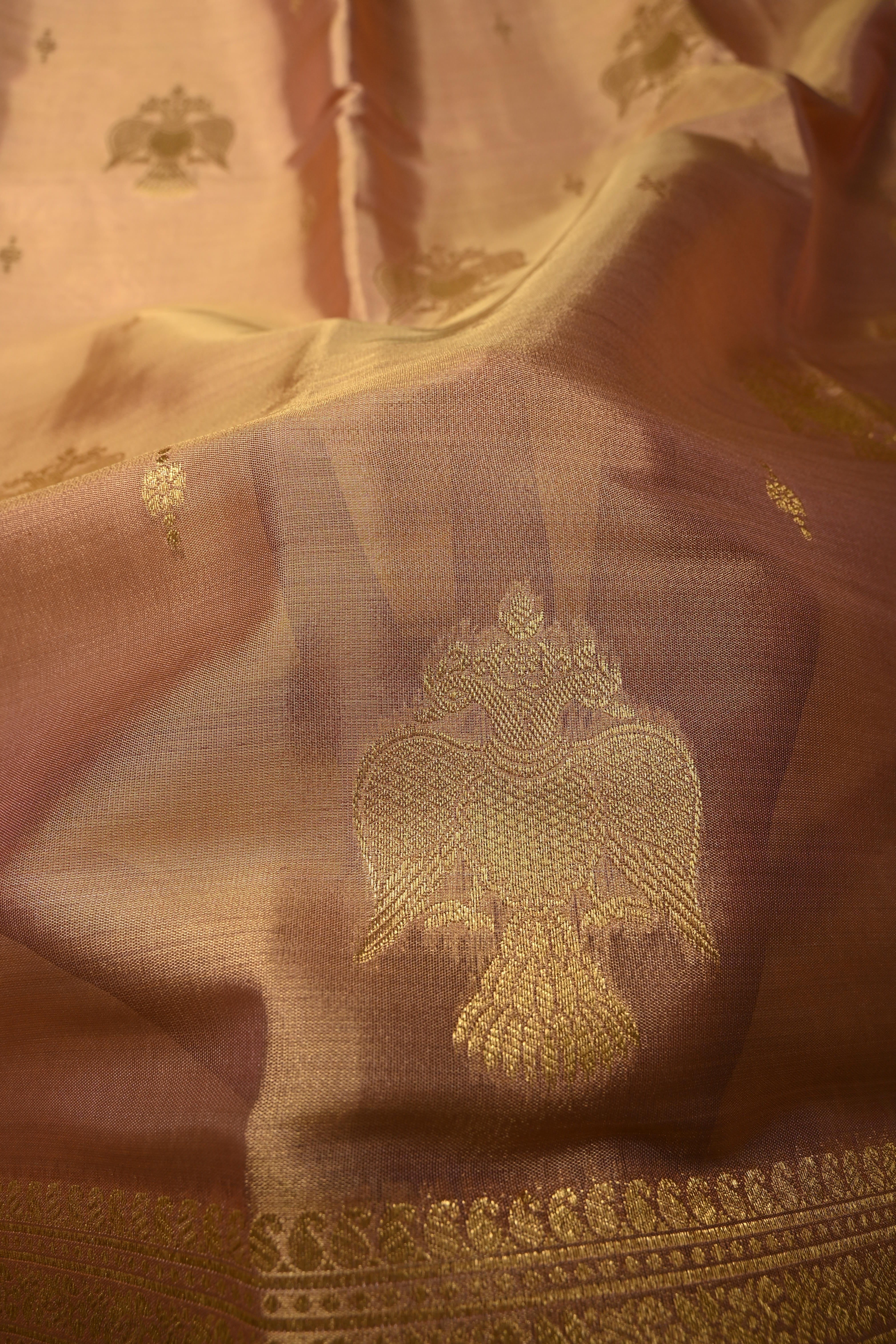 Dusty Pink-Gold Kanchi Tissue Semi Silk Saree with Gandaberunda Zari Buttas and Zari Border | Shobitam