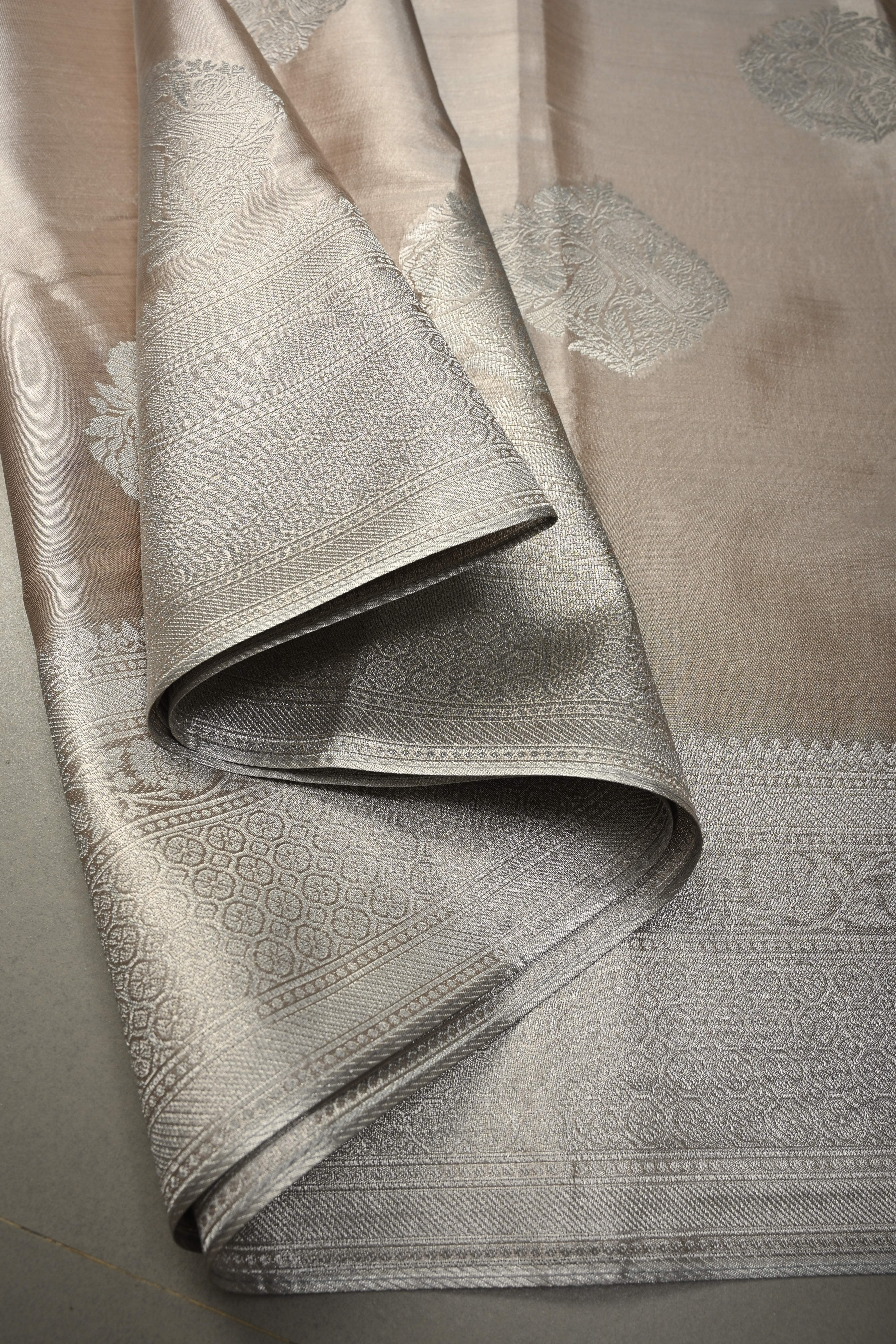 Taupe-Silver Kanchi Tissue Semi Silk Saree with Parrot Zari Buttas and Zari Border | Shobitam
